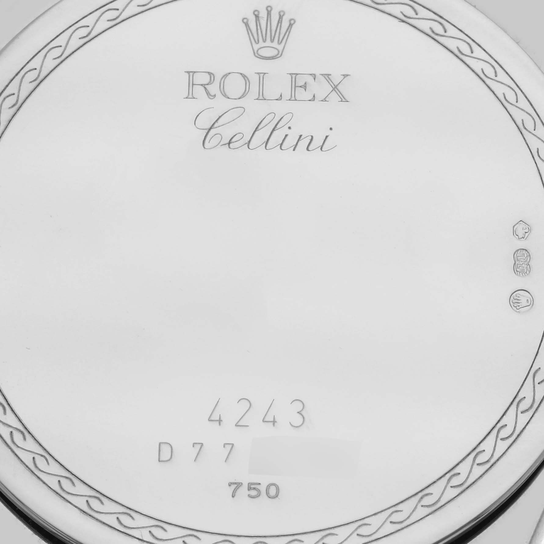 The image shows the back of a Rolex Cellini 4243/9 Men's White Gold Silver Dial 4243/9 Men's White Gold Silver Dial watch case, featuring engravings and serial numbers.