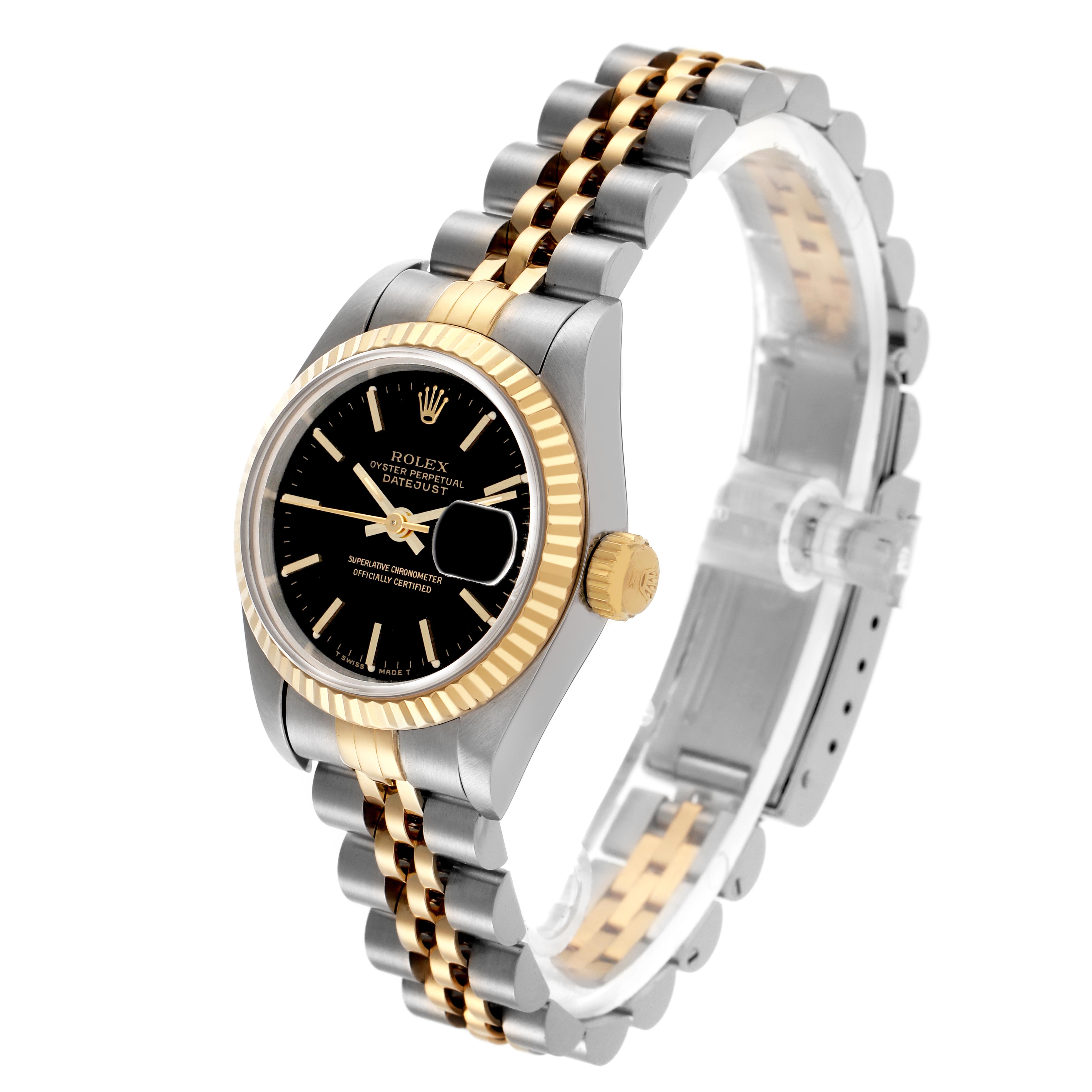The Rolex Date 69173 Women's Steel and Gold (two tone) Black Dial 69173 Women's Steel and Gold (two tone) Black Dial model is shown at an angle highlighting the dial, bezel, crown, and part of the bracelet.
