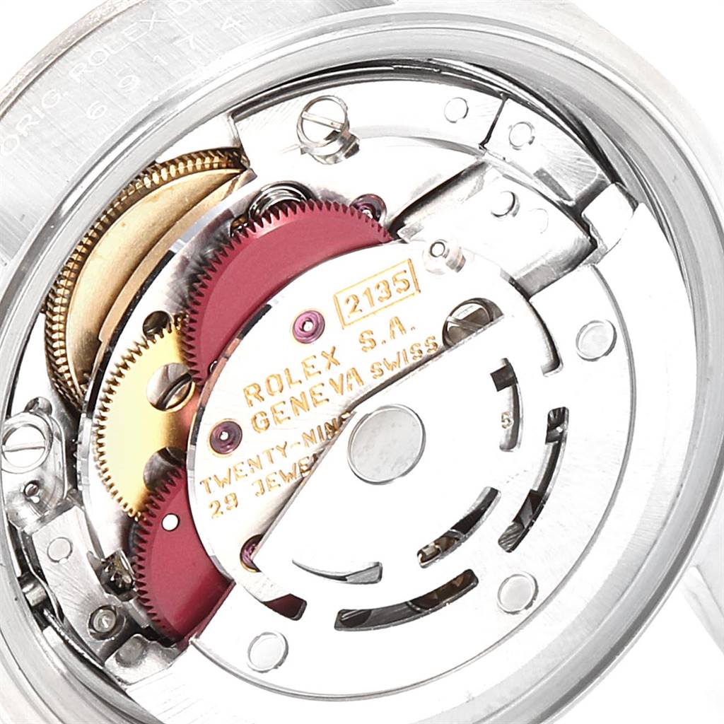 The image shows the movement and inner mechanism of a Rolex Datejust 69174 Women
s Stainless Steel Silver Dial 69174 Women
s Stainless Steel Silver Dial watch from a close-up, top-down angle.