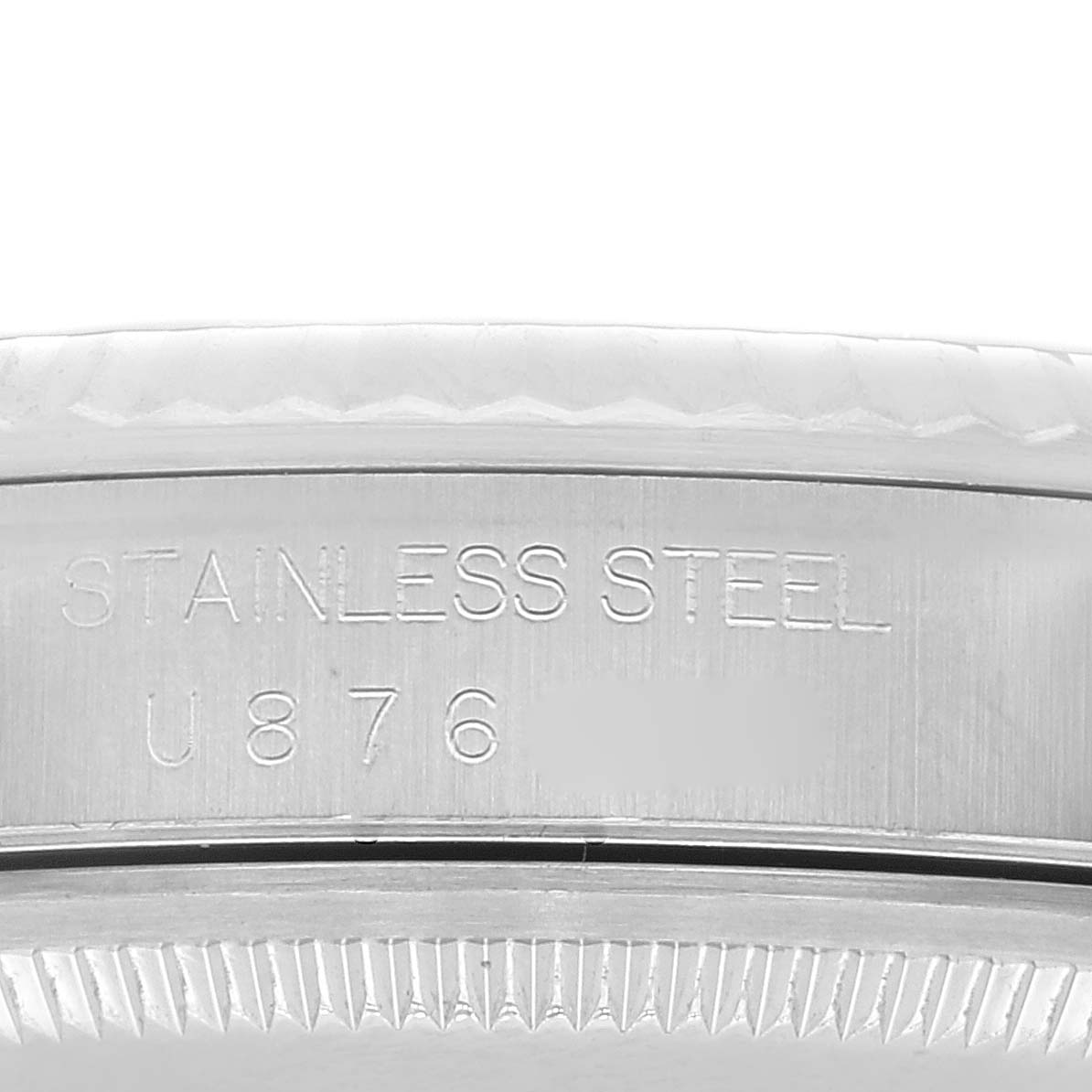 The image shows a close-up of the caseback of a Rolex Datejust 16234 Men's Stainless Steel Blue Dial 16234 Men's Stainless Steel Blue Dial, focusing on the "Stainless Steel" engraving.