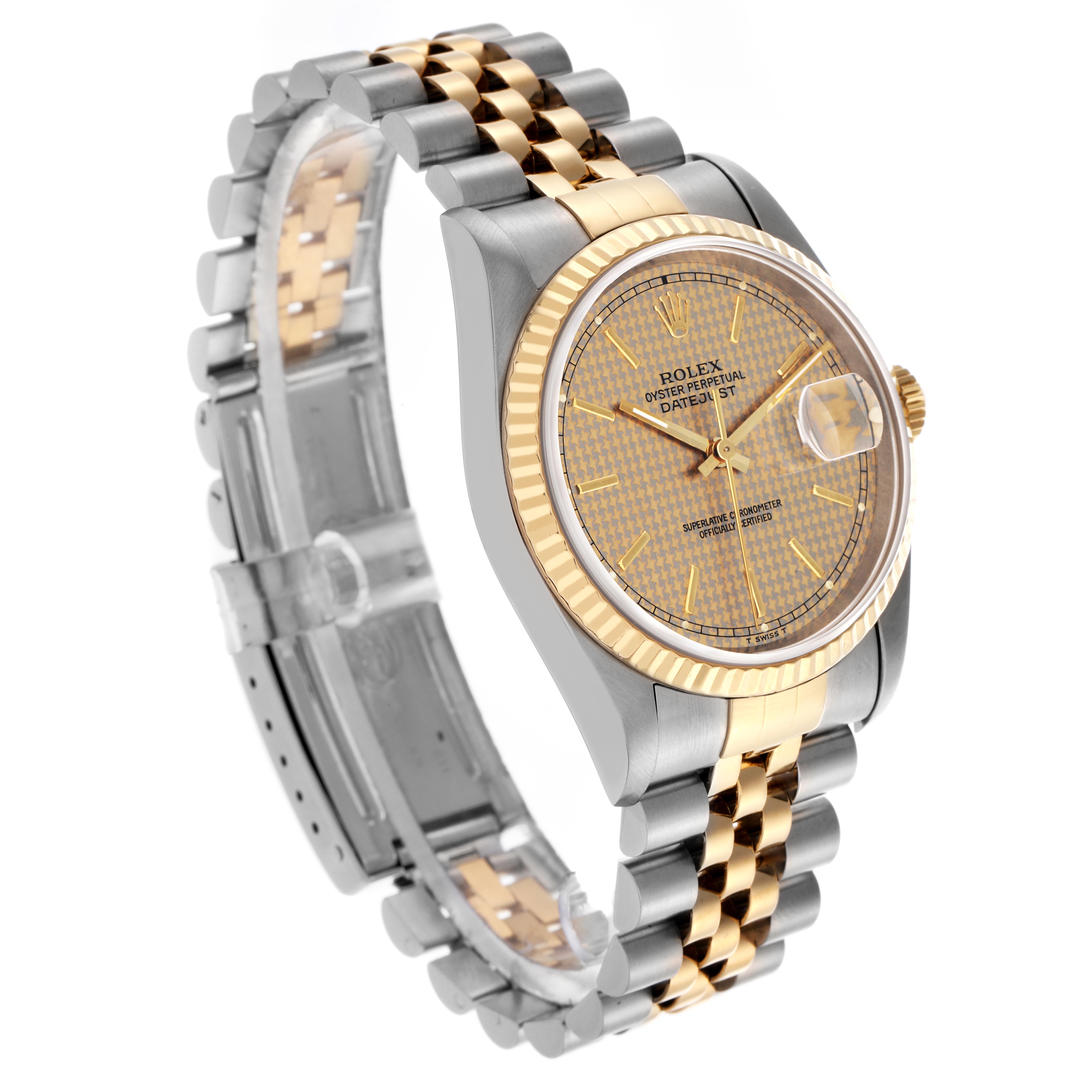 The Rolex Datejust 16233 Men's Steel and Gold (two tone) Champagne Dial 16233 Men's Steel and Gold (two tone) Champagne Dial watch is shown at an angle highlighting its gold and stainless steel case, jubilee bracelet, and detailed dial.