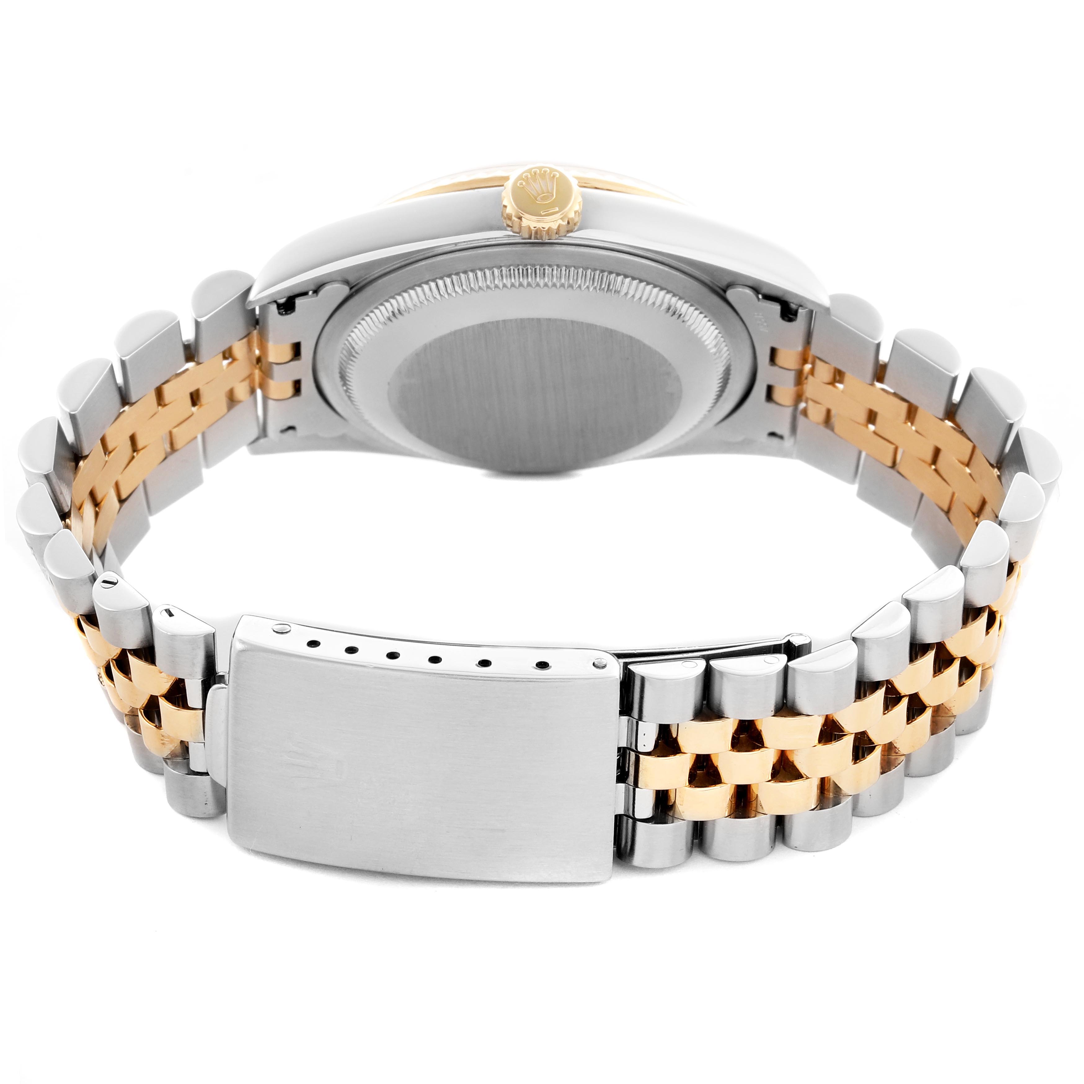 The image shows the back of a Rolex Datejust 16233 Men's Steel and Gold (two tone) Champagne Dial 16233 Men's Steel and Gold (two tone) Champagne Dial watch, highlighting the bracelet, clasp, and case back.