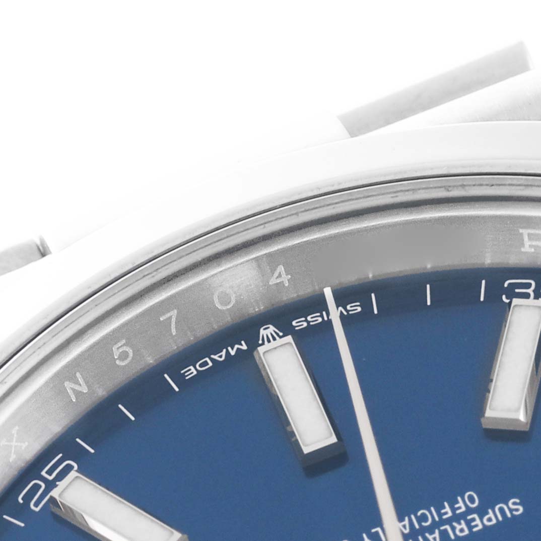 The image shows a close-up angle of the dial and bezel of the Rolex Datejust 41 126300 Men
s Stainless Steel Blue Dial 126300 Men
s Stainless Steel Blue Dial model, highlighting the "SWISS MADE" text.