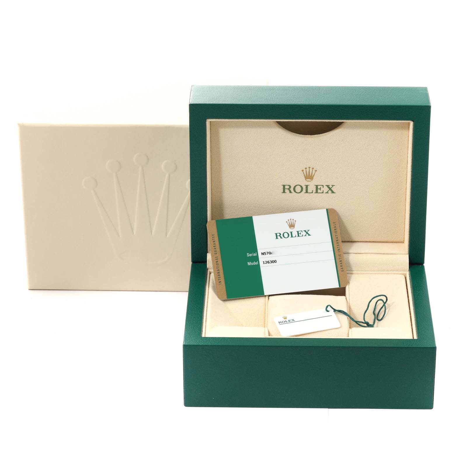 The image shows the packaging, warranty card, and tag for the Rolex Datejust 41 126300 Men
s Stainless Steel Blue Dial 126300 Men
s Stainless Steel Blue Dial model from a front angle.