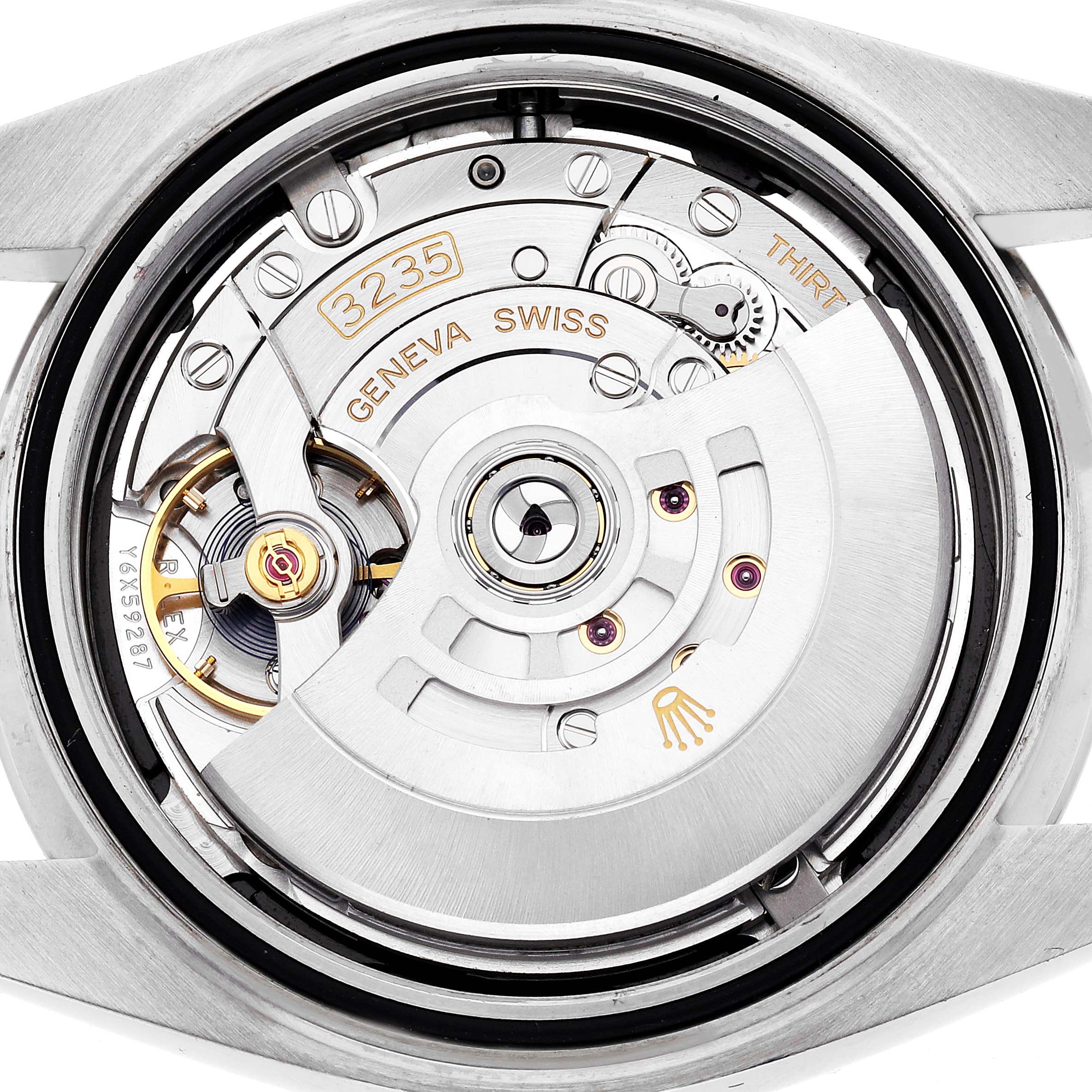 The image shows the movement of the Rolex Datejust 41 126300 Men's Stainless Steel Black Dial 126300 Men's Stainless Steel Black Dial, focusing on the intricate mechanics, rotor, and inscriptions.