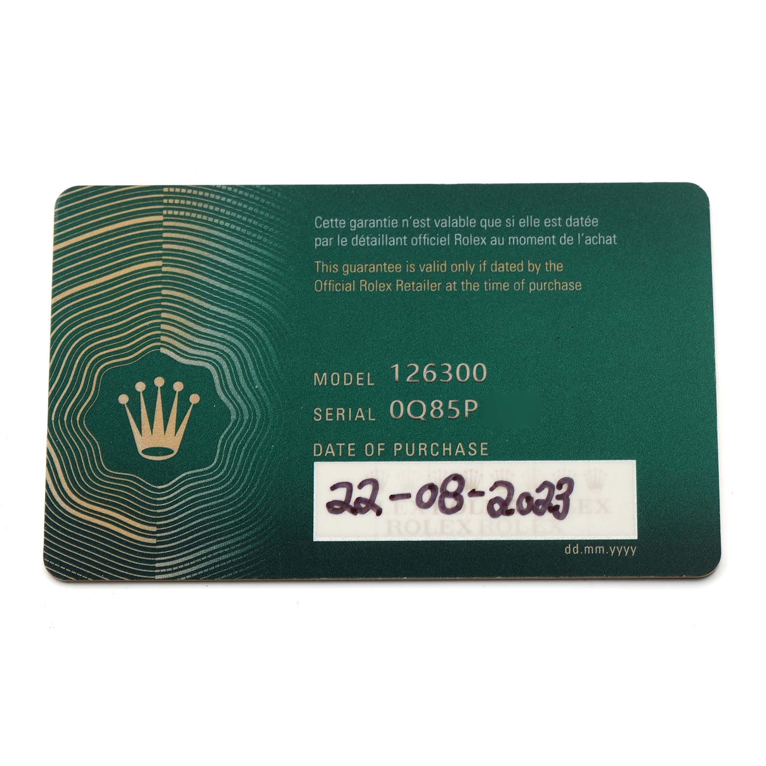 This image shows the warranty card for the Rolex Datejust 41 126300 Men's Stainless Steel Black Dial 126300 Men's Stainless Steel Black Dial, featuring model and serial numbers with date of purchase.