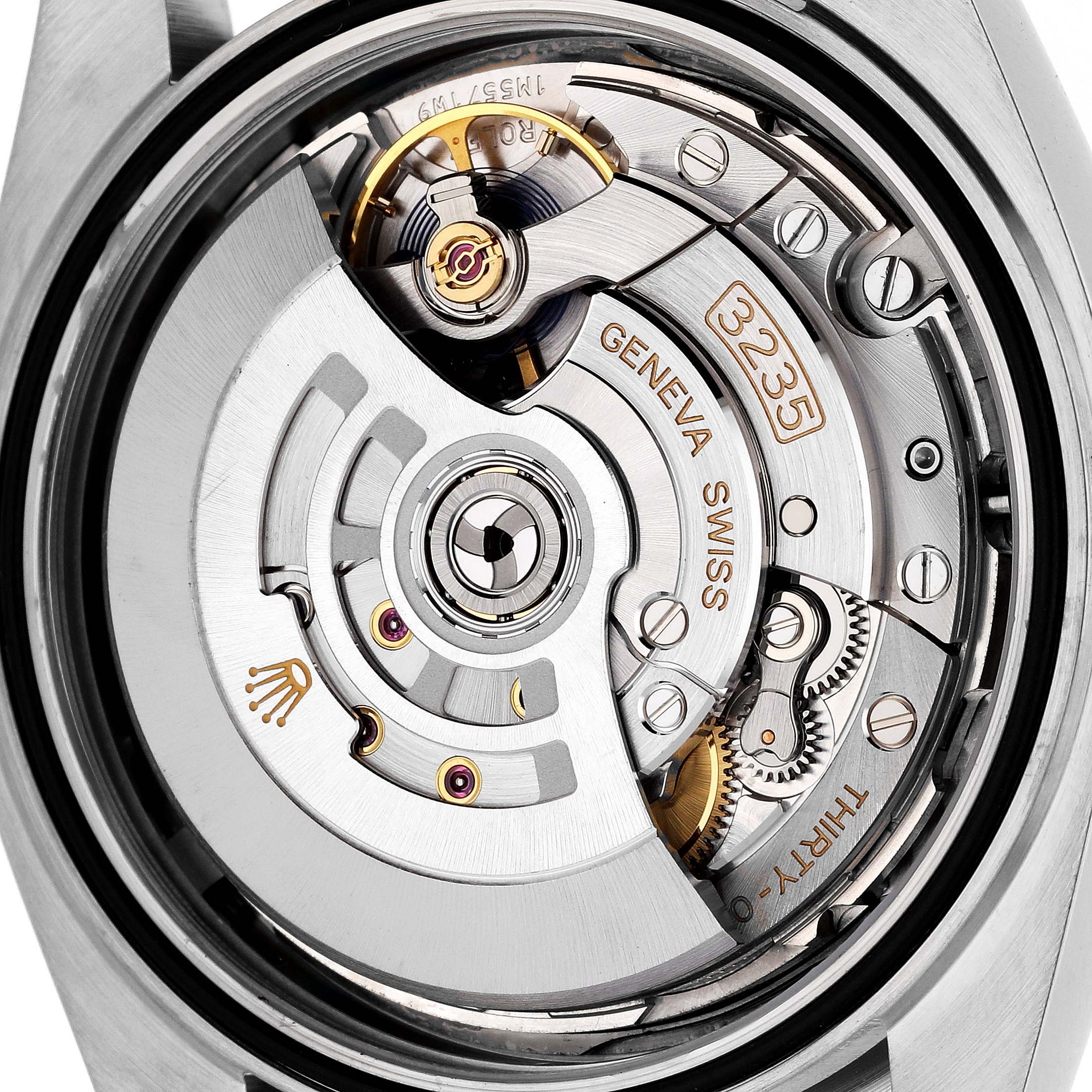 This image shows the movement of a Rolex Datejust 41 126334 Men
s Stainless Steel Grey Dial 126334 Men
s Stainless Steel Grey Dial watch from the back, highlighting the intricate internal mechanisms.
