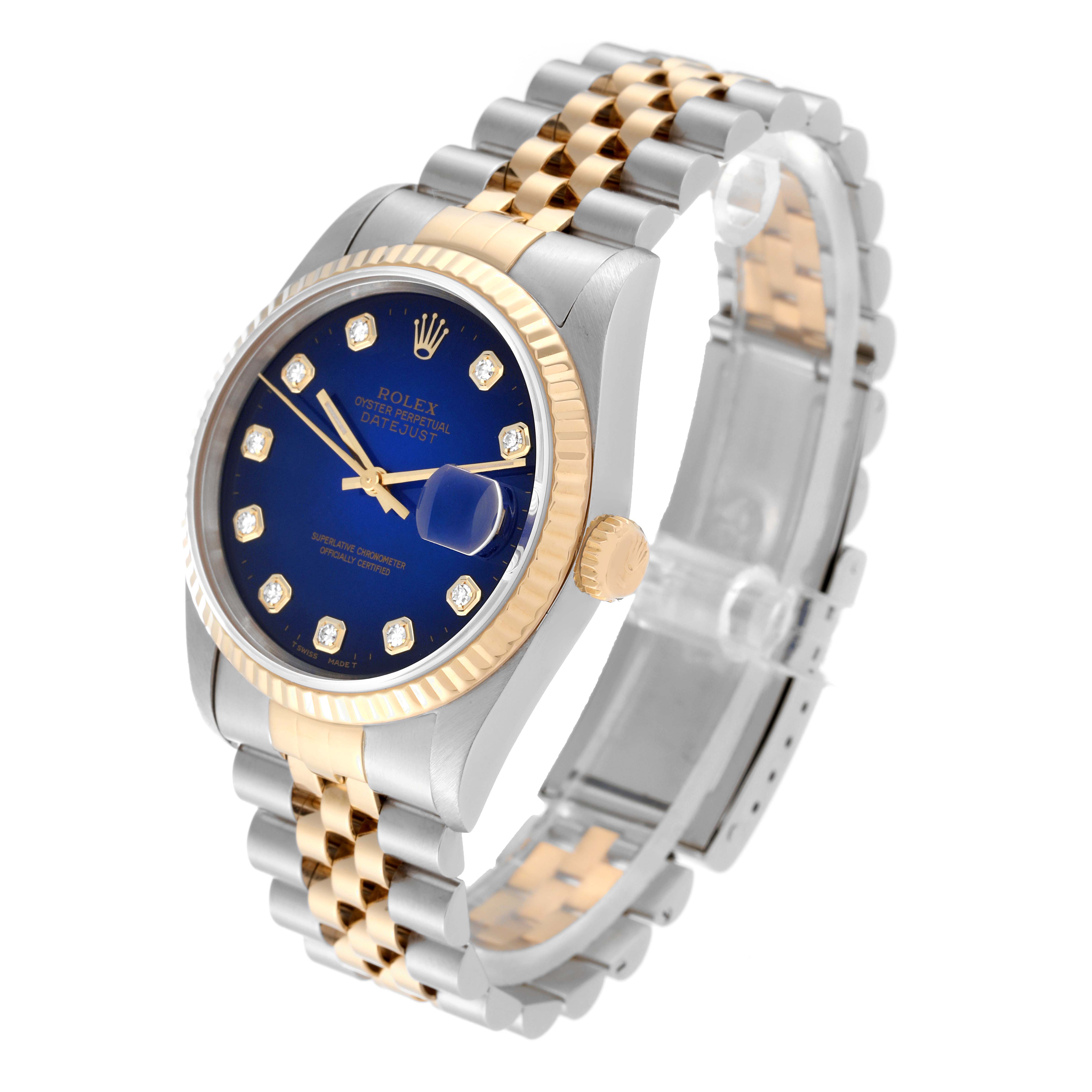 This image shows a Rolex Datejust 16233 Men's Steel and Gold (two tone) Blue Dial 16233 Men's Steel and Gold (two tone) Blue Dial watch at a slight angle, highlighting its two-tone bracelet, blue dial, and fluted bezel.