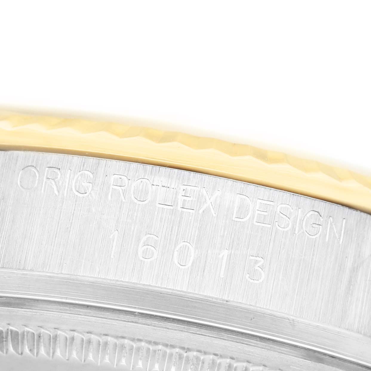 The image shows a close-up of the side engraving on a Rolex Datejust 16013 Men's Steel and Gold (two tone) Champagne Dial watch case with model number "16013."