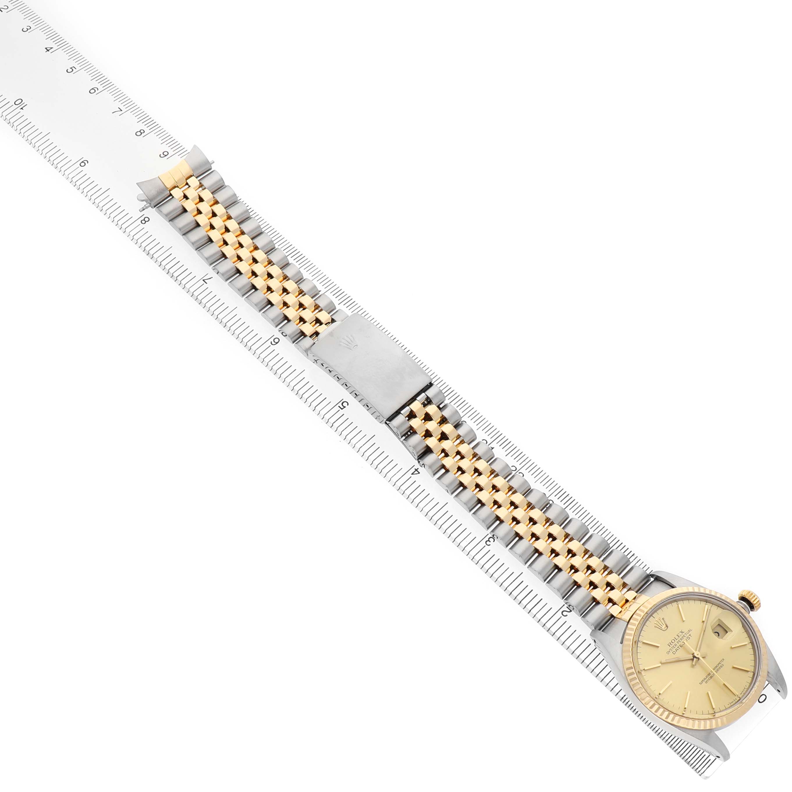 The Rolex Datejust 16013 Men's Steel and Gold (two tone) Champagne Dial watch is shown from a top angle, displaying the full bracelet, clasp, and dial.