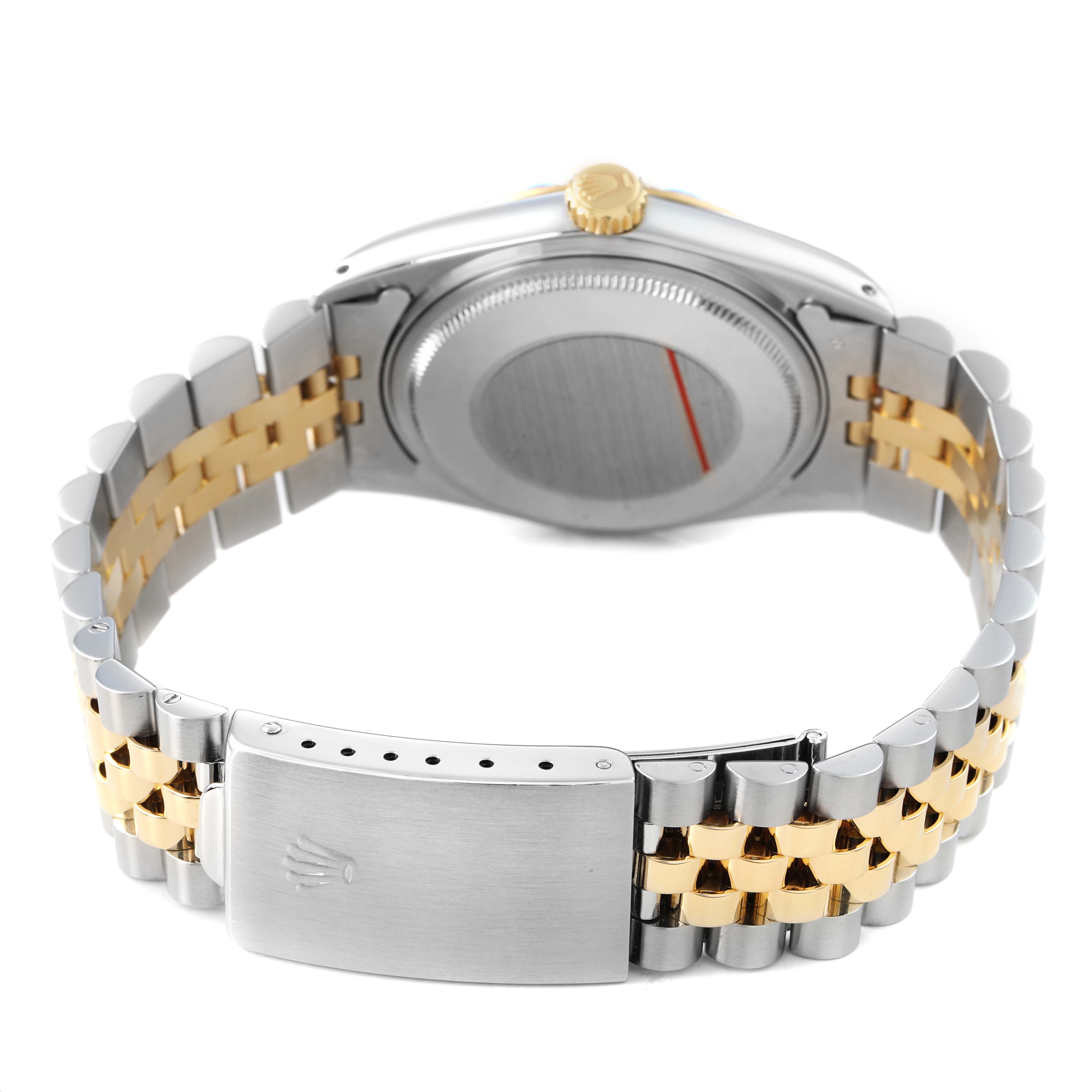 The Rolex Datejust 16013 Men's Steel and Gold (two tone) Champagne Dial watch is shown from the back, highlighting the clasp and bracelet in a two-tone metal design.