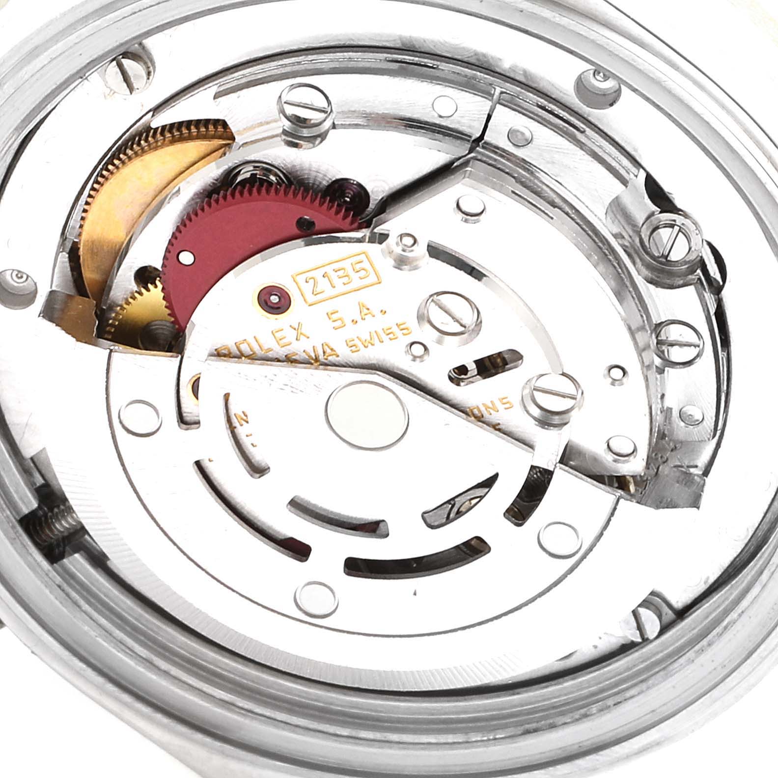 This close-up image shows the intricate internal movement parts of a Rolex Mid-Size 68273 Women
s Steel and Gold (two tone) Black Dial 68273 Women
s Steel and Gold (two tone) Black Dial model watch.