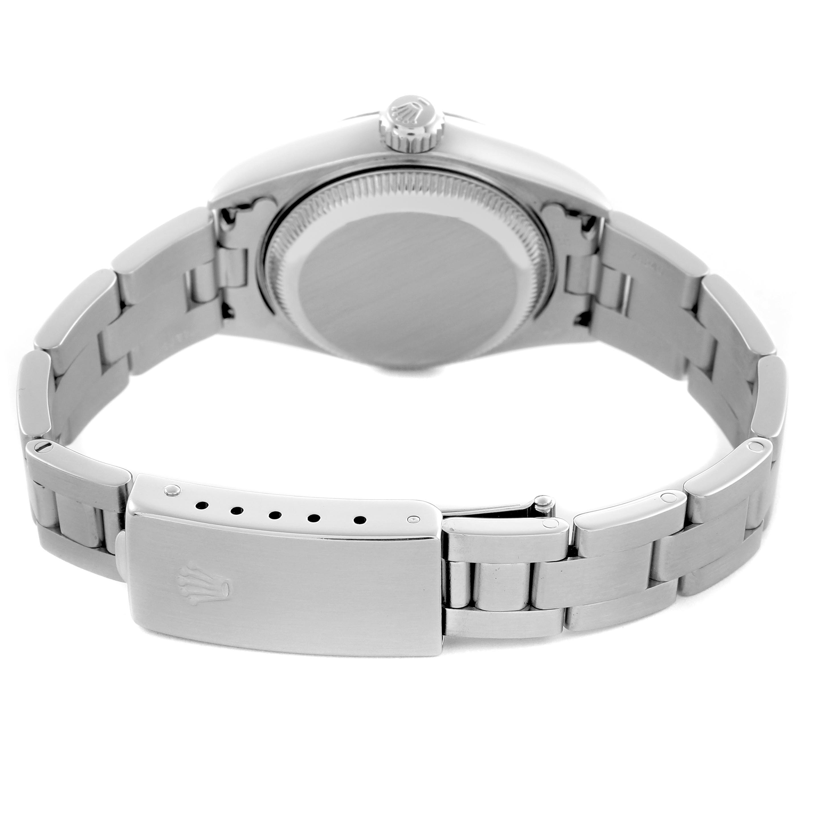 The image shows the back view of a Rolex Datejust 79174 Women's Stainless Steel Mother of Pearl Dial 79174 Women's Stainless Steel Mother of Pearl Dial, focusing on the case back, bracelet, and clasp.