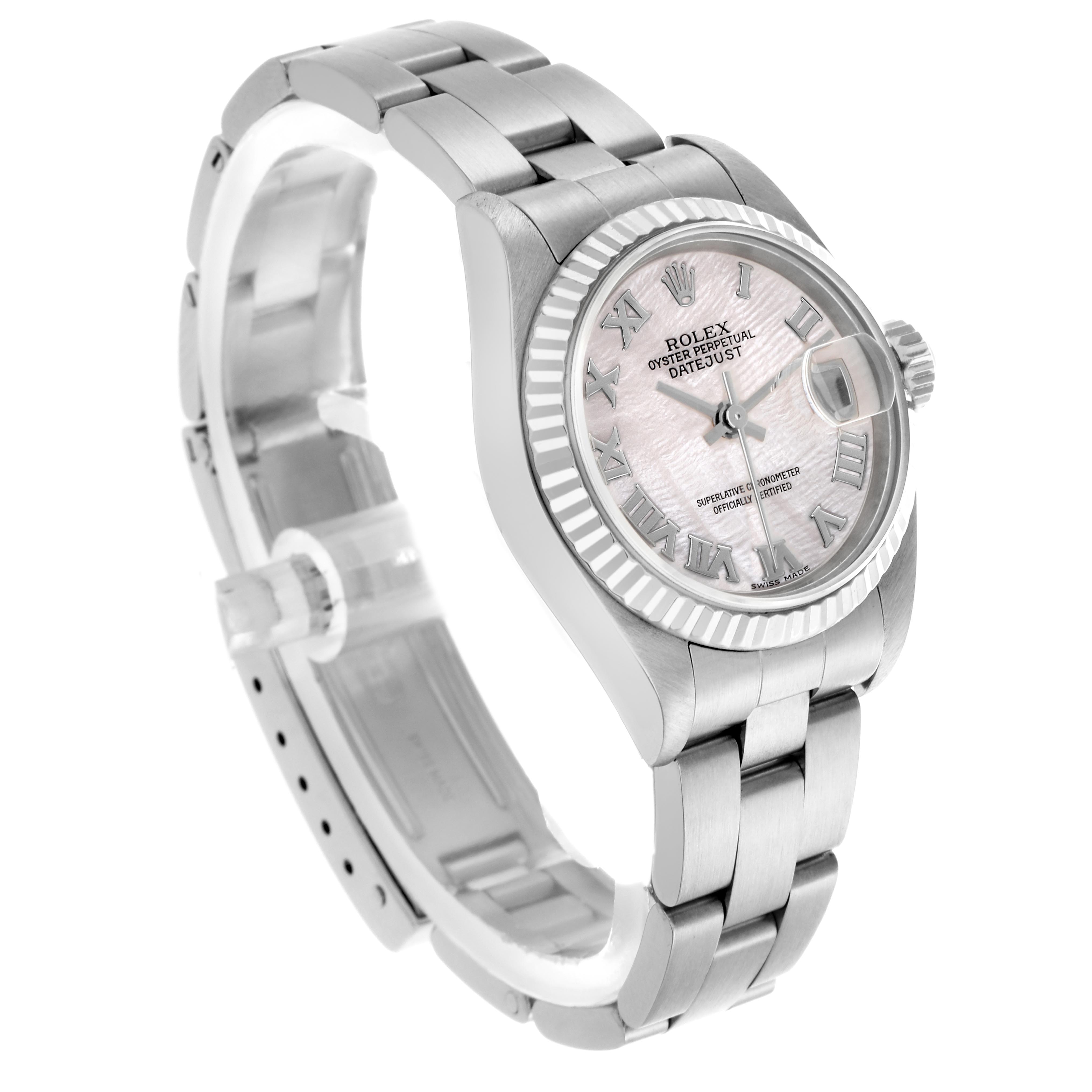 The Rolex Datejust 79174 Women's Stainless Steel Mother of Pearl Dial 79174 Women's Stainless Steel Mother of Pearl Dial watch is shown at a three-quarter angle, highlighting the face, bracelet, and fluted bezel.