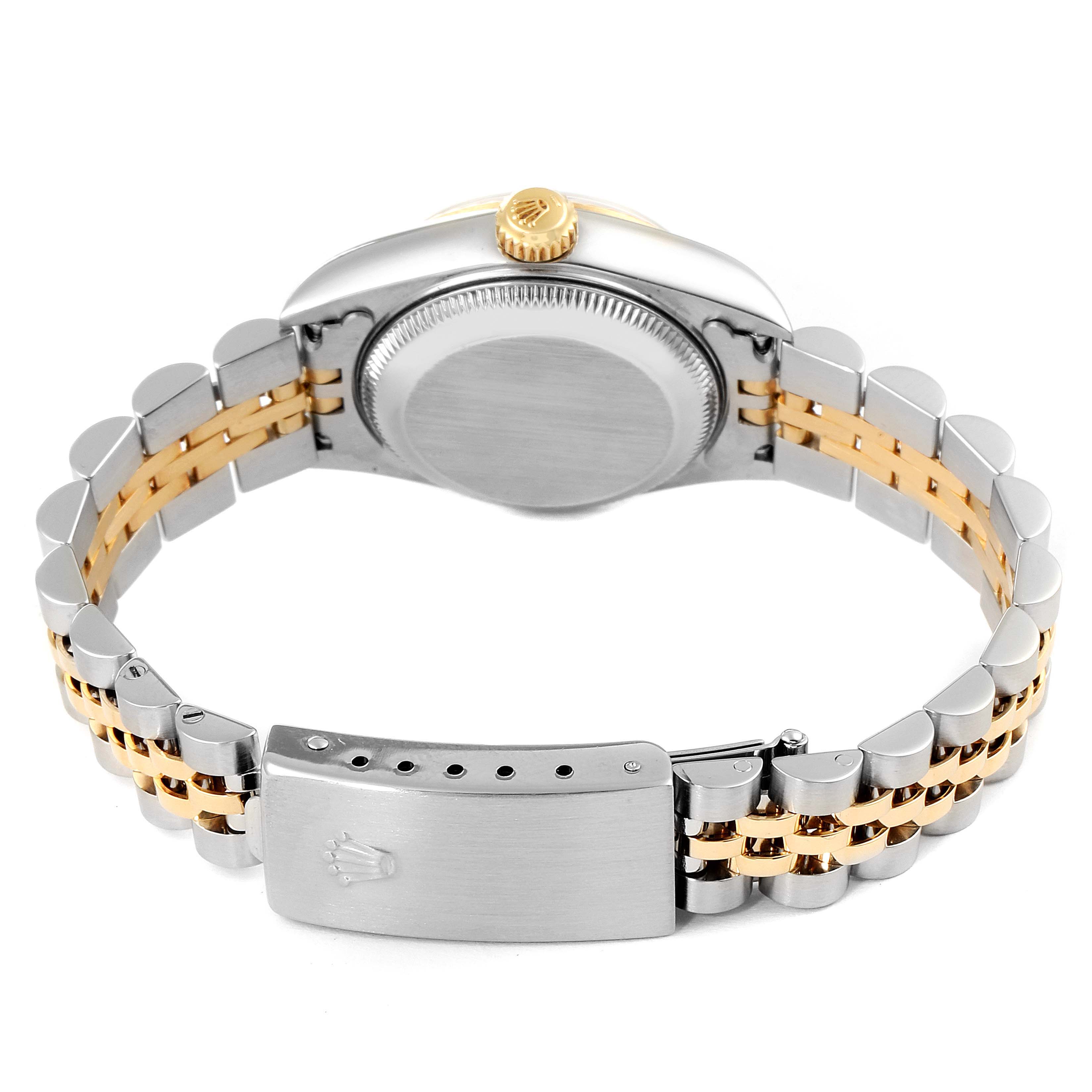 The image shows the back view of a Rolex Datejust 79173 Women's Steel and Gold (two tone) Blue Dial 79173 Women's Steel and Gold (two tone) Blue Dial watch, highlighting the case back, crown, and bracelet clasp.