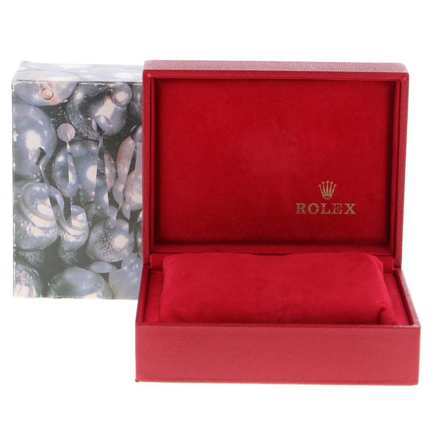This image shows the open red Rolex watch box for the Datejust model, along with its outer decorative packaging.