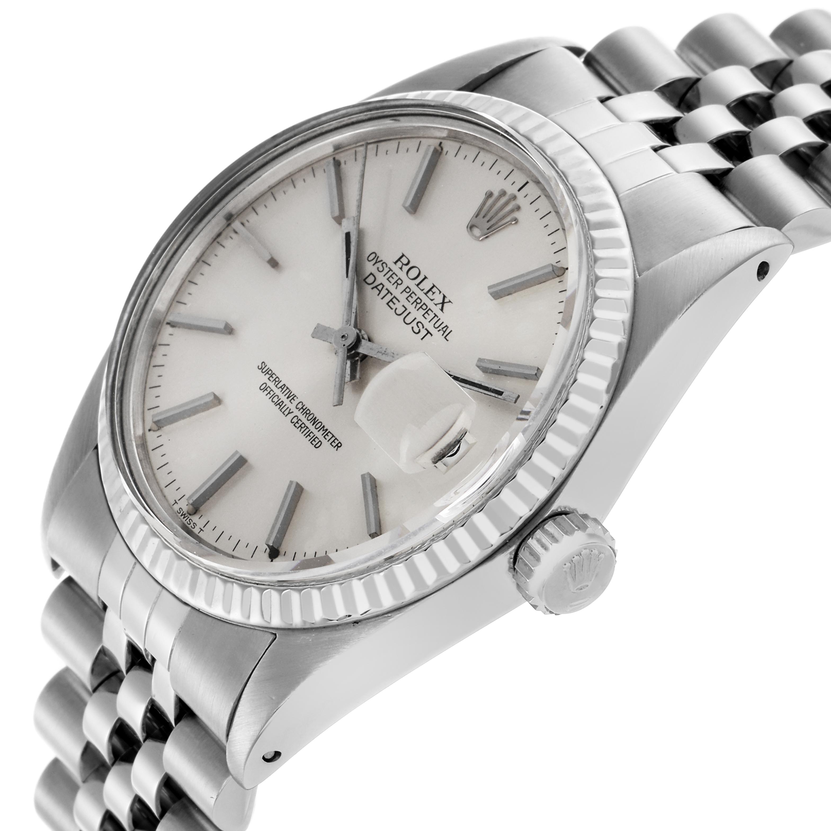 The Rolex Datejust 16014 Men's Stainless Steel Silver Dial 16014 Men's Stainless Steel Silver Dial watch is shown at a side angle, featuring the watch face, bezel, crown, and part of the bracelet.