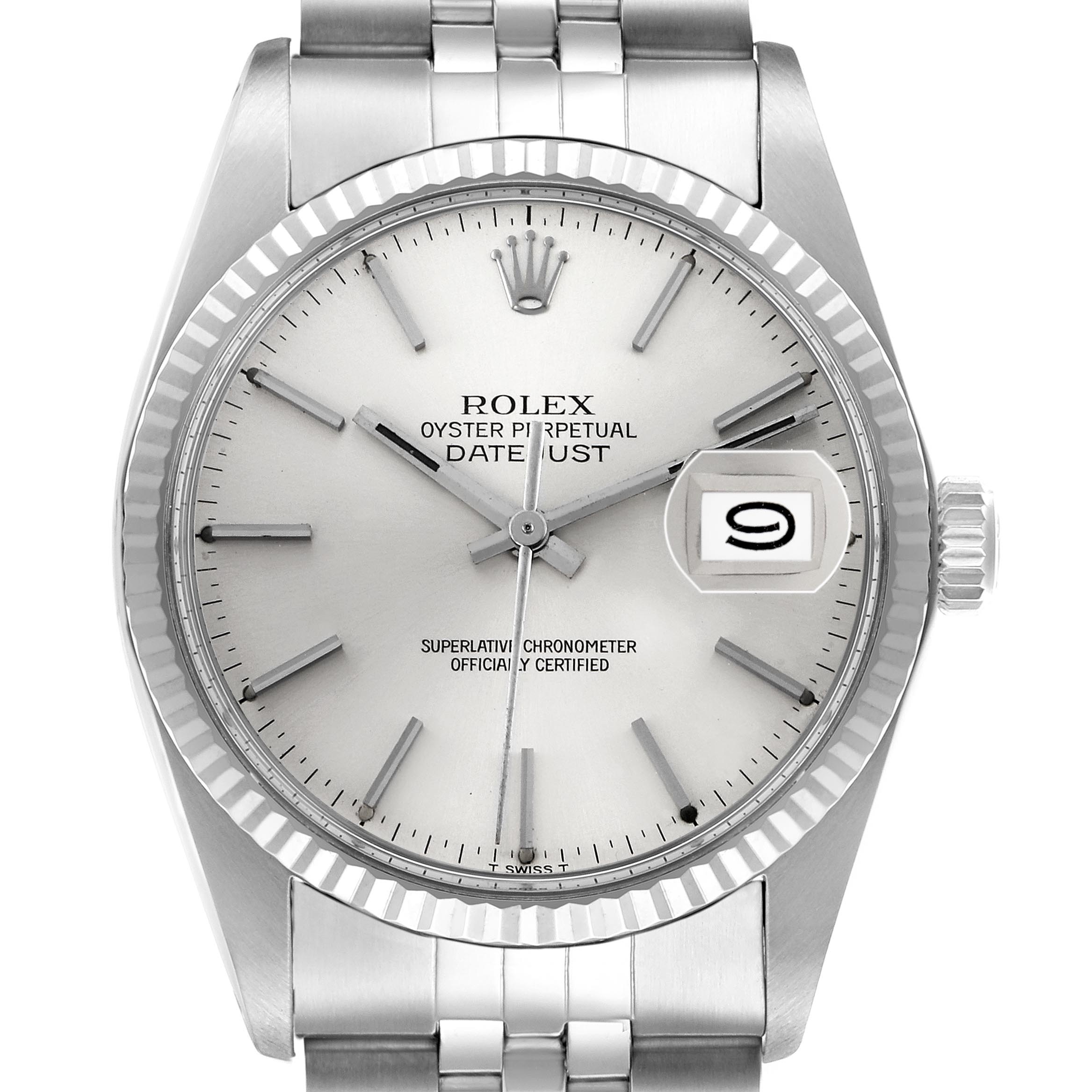 The Rolex Datejust 16014 Men's Stainless Steel Silver Dial 16014 Men's Stainless Steel Silver Dial watch is shown from the front, displaying its dial, fluted bezel, crown, and bracelet.