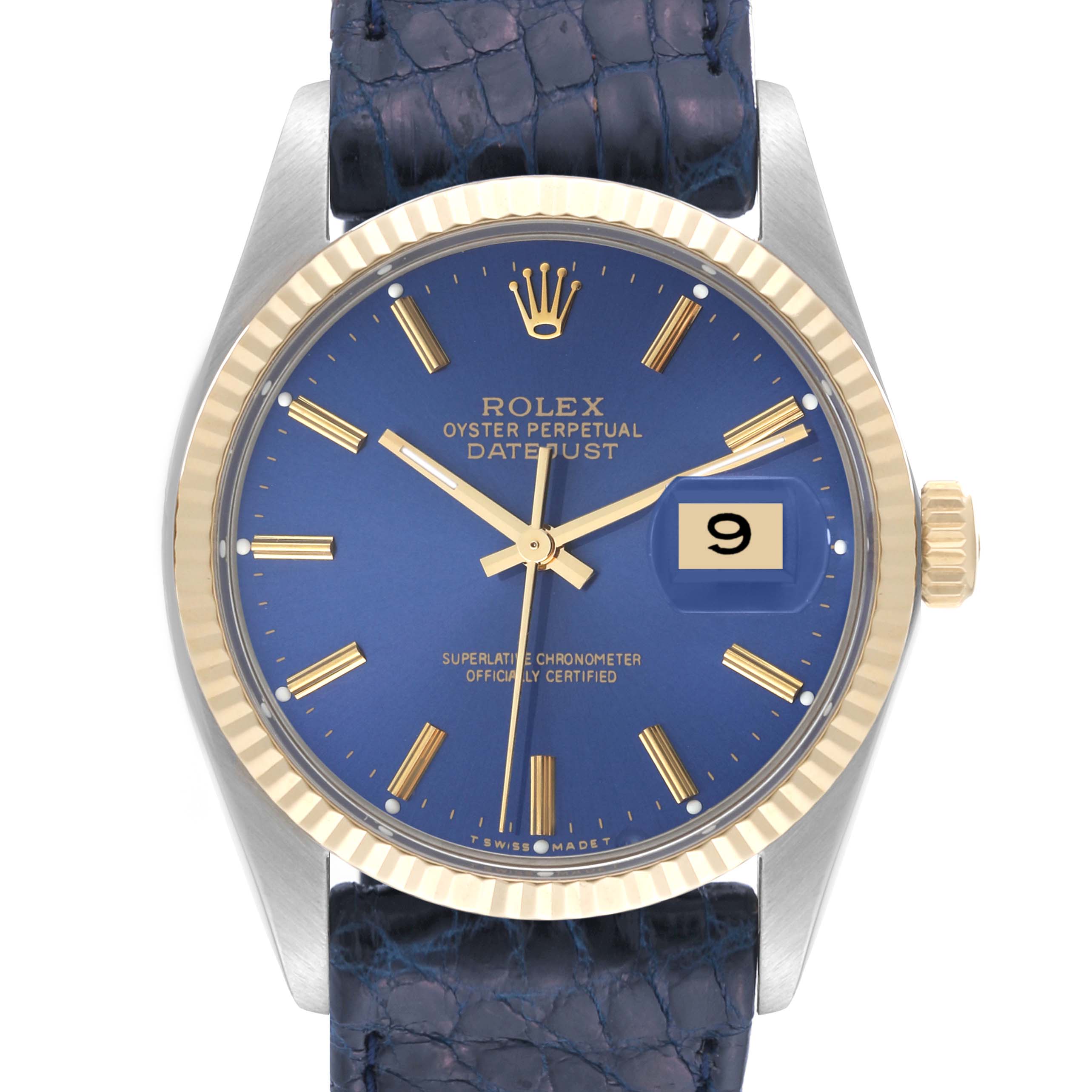 The image shows a close-up of a Rolex Vintage Collection 16013 Men's Steel and Gold (two tone) Blue Dial 16013 Men's Steel and Gold (two tone) Blue Dial watch with a blue dial, gold markers, a date window, and a blue leather strap.