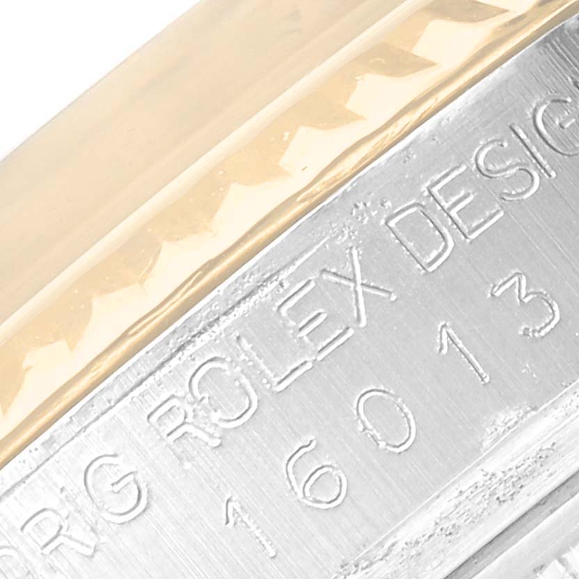 The image shows a close-up of the model number and "ROLEX DESIGN" engraving on the case side of a Vintage Collection Rolex watch.