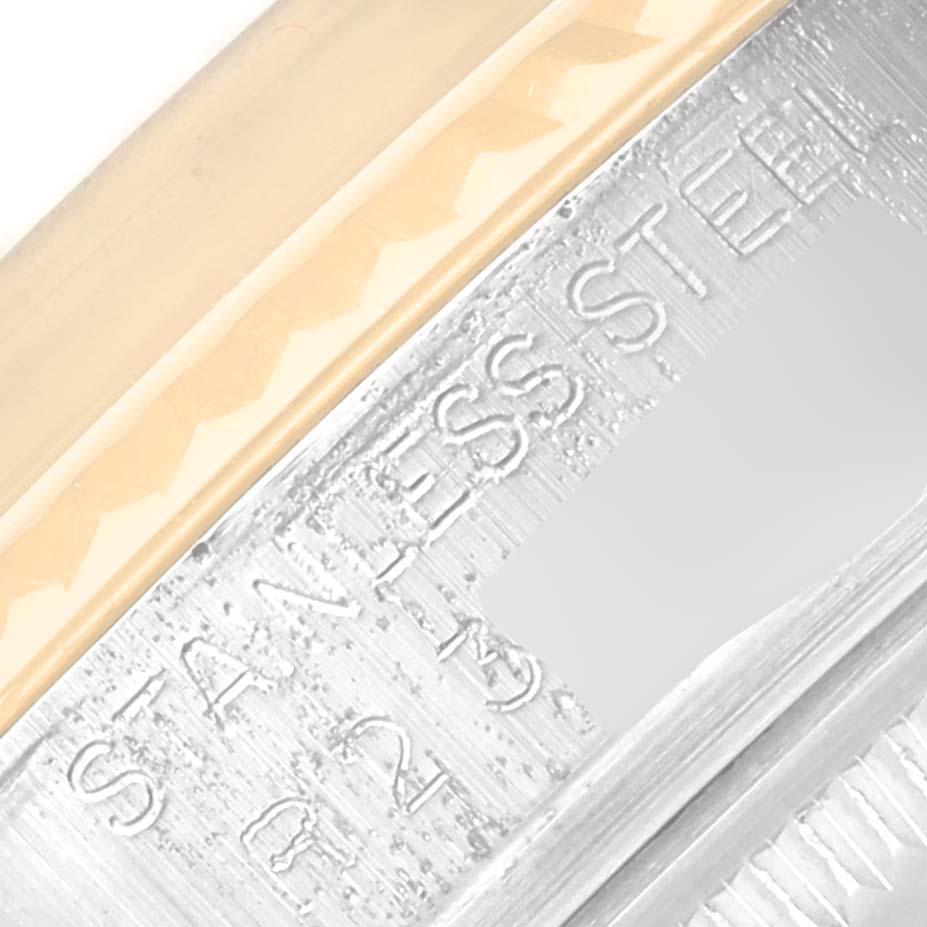 This is a close-up angle showing the bezel and engraved marking detail of the Rolex Vintage Collection 16013 Men's Steel and Gold (two tone) Blue Dial 16013 Men's Steel and Gold (two tone) Blue Dial model.