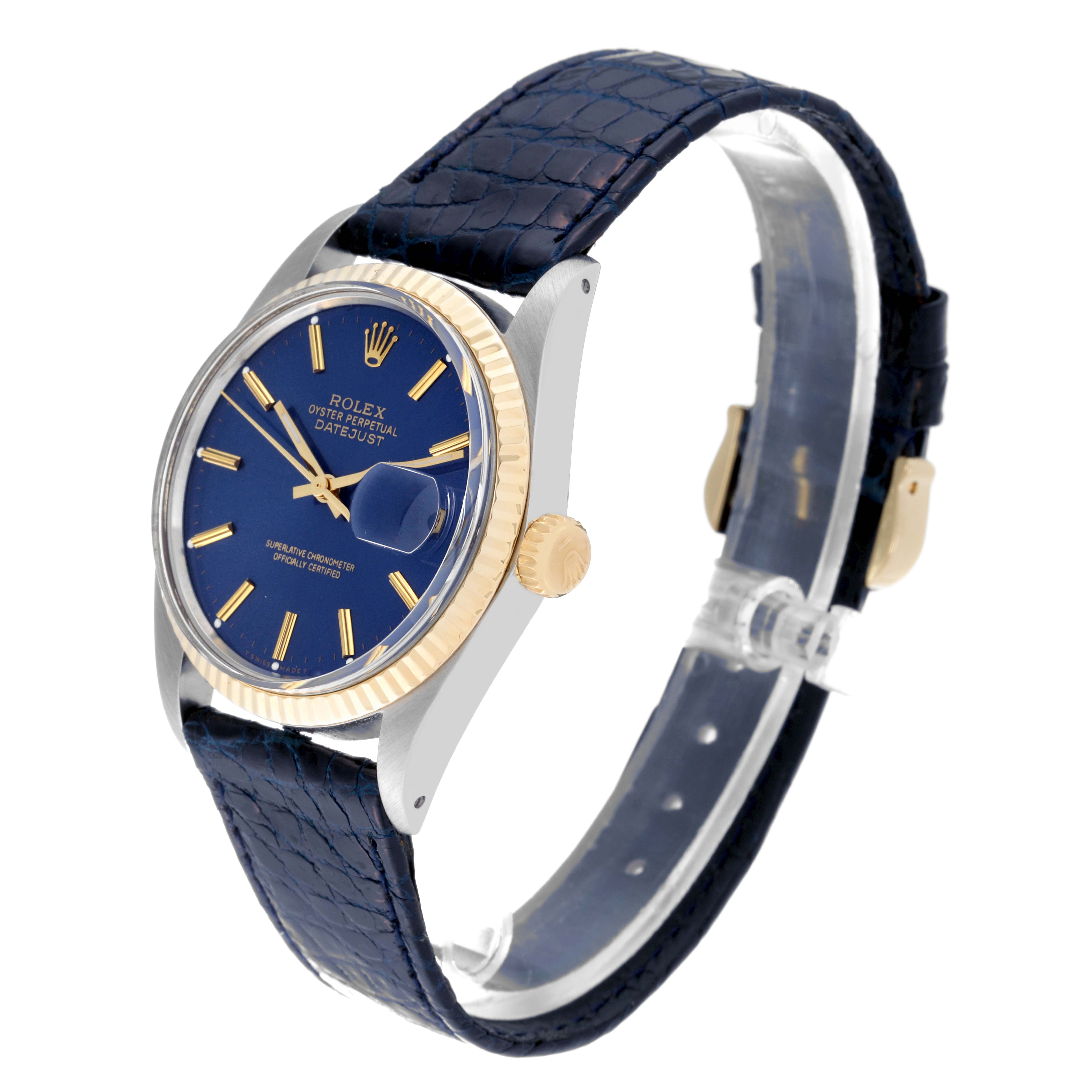The image shows a side angle of the Rolex Vintage Collection 16013 Men's Steel and Gold (two tone) Blue Dial 16013 Men's Steel and Gold (two tone) Blue Dial watch, displaying its blue dial, gold bezel, and blue leather strap.