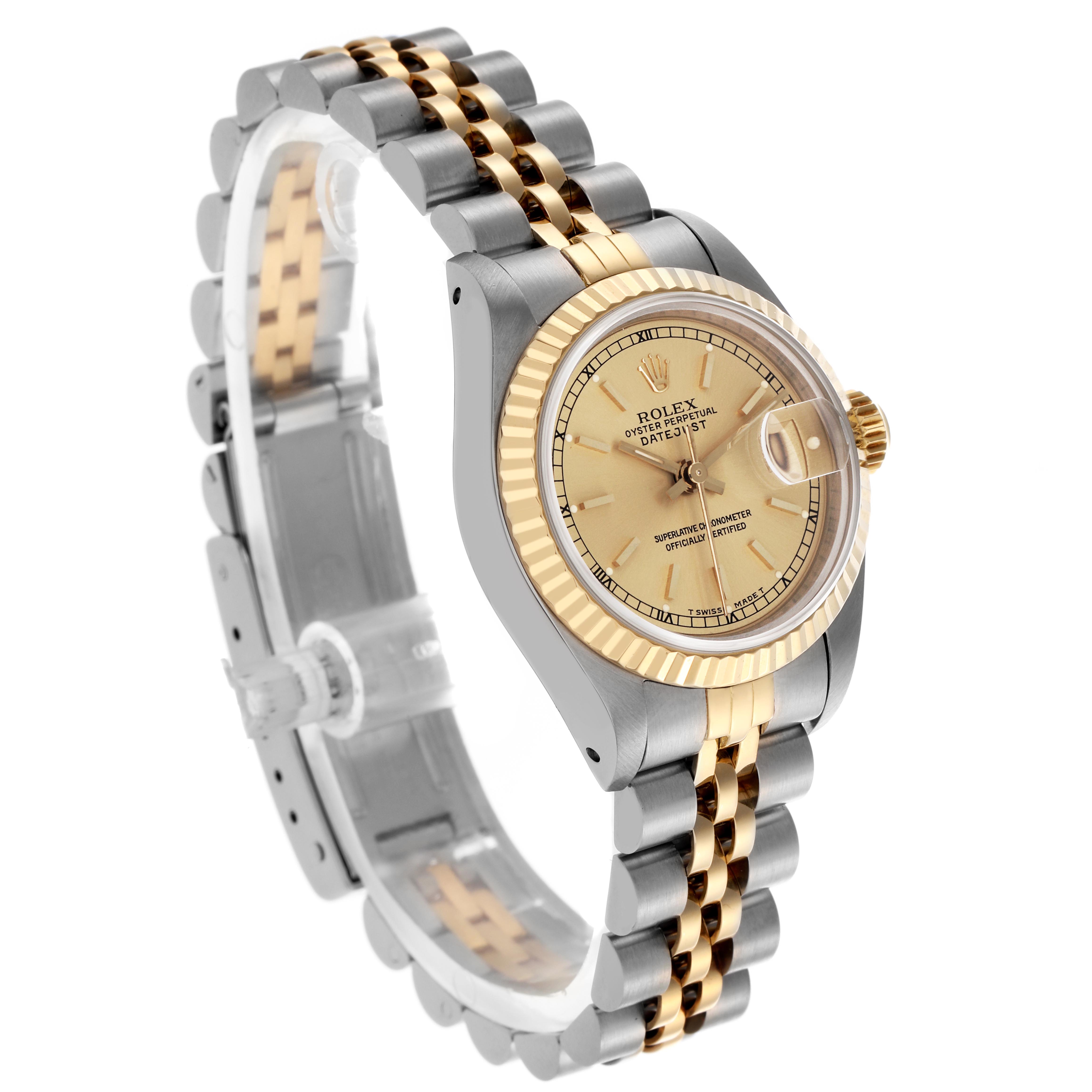 The image shows a side angle of the Rolex Datejust 69173 Women's Steel and Gold (two tone) Champagne Dial 69173 Women's Steel and Gold (two tone) Champagne Dial, highlighting its fluted bezel, champagne dial, and Jubilee bracelet.