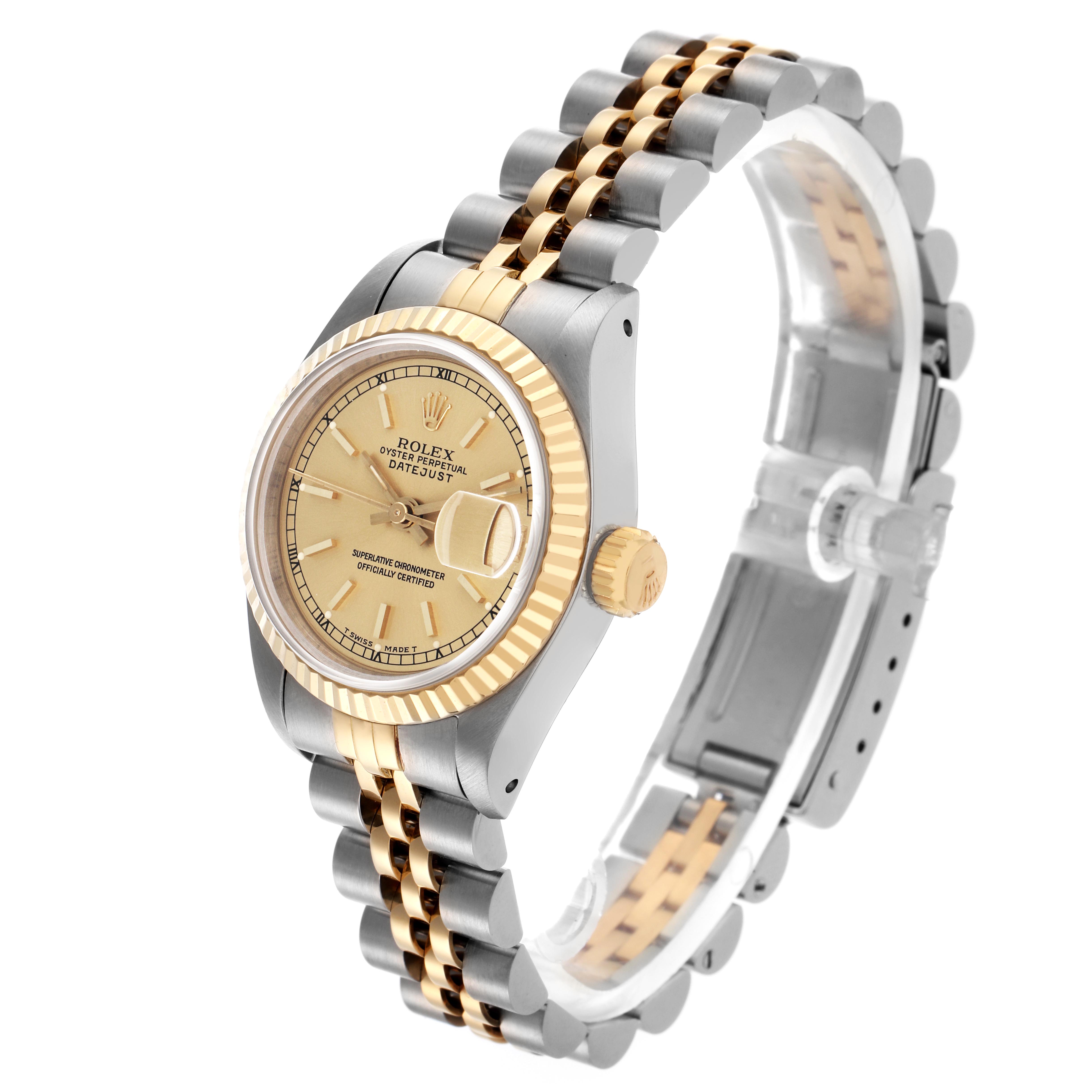 The Rolex Datejust 69173 Women's Steel and Gold (two tone) Champagne Dial 69173 Women's Steel and Gold (two tone) Champagne Dial watch is shown at a diagonal angle, highlighting the gold and silver bracelet, fluted bezel, and crown.