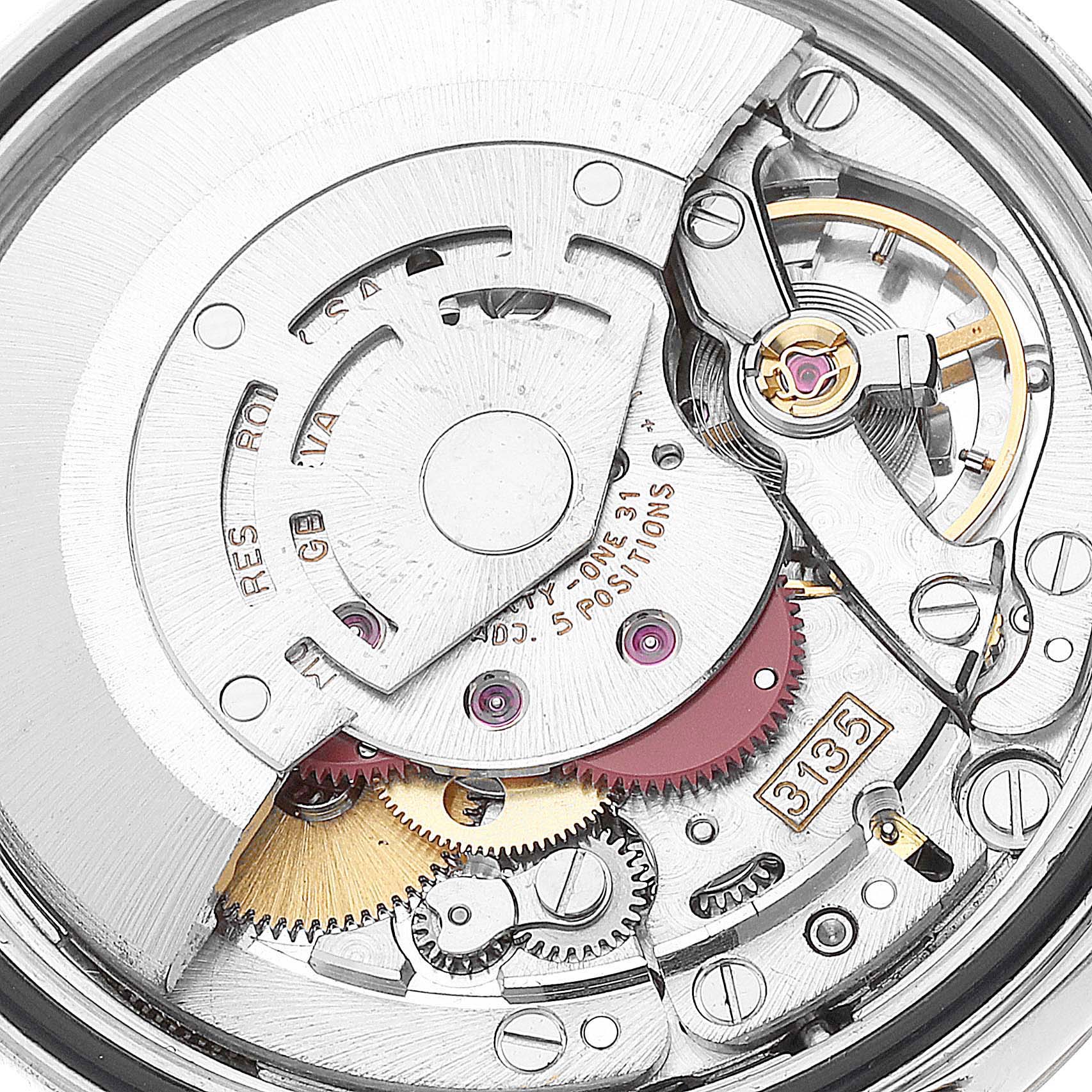 This image shows the intricate movement mechanism of a Rolex Datejust 16233 Men's Steel and Gold (two tone)  16233 Men's Steel and Gold (two tone)  watch from a close-up angle.