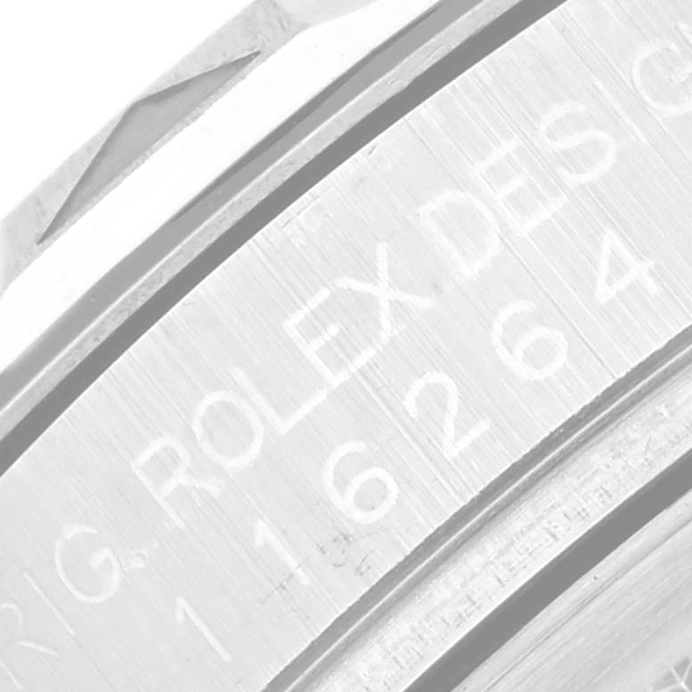 This image shows a close-up of the serial number engraving on the casing of a Rolex Turn-o-Graph 116264 Men
s Stainless Steel Black Dial 116264 Men
s Stainless Steel Black Dial watch.