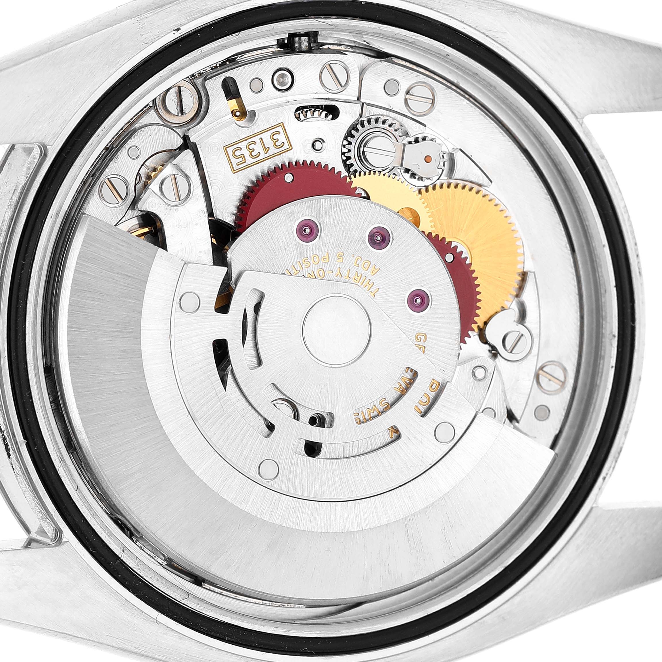 The image shows the movement mechanism of a Rolex Datejust 116234 Men's Stainless Steel White Dial watch, viewed from a back perspective.