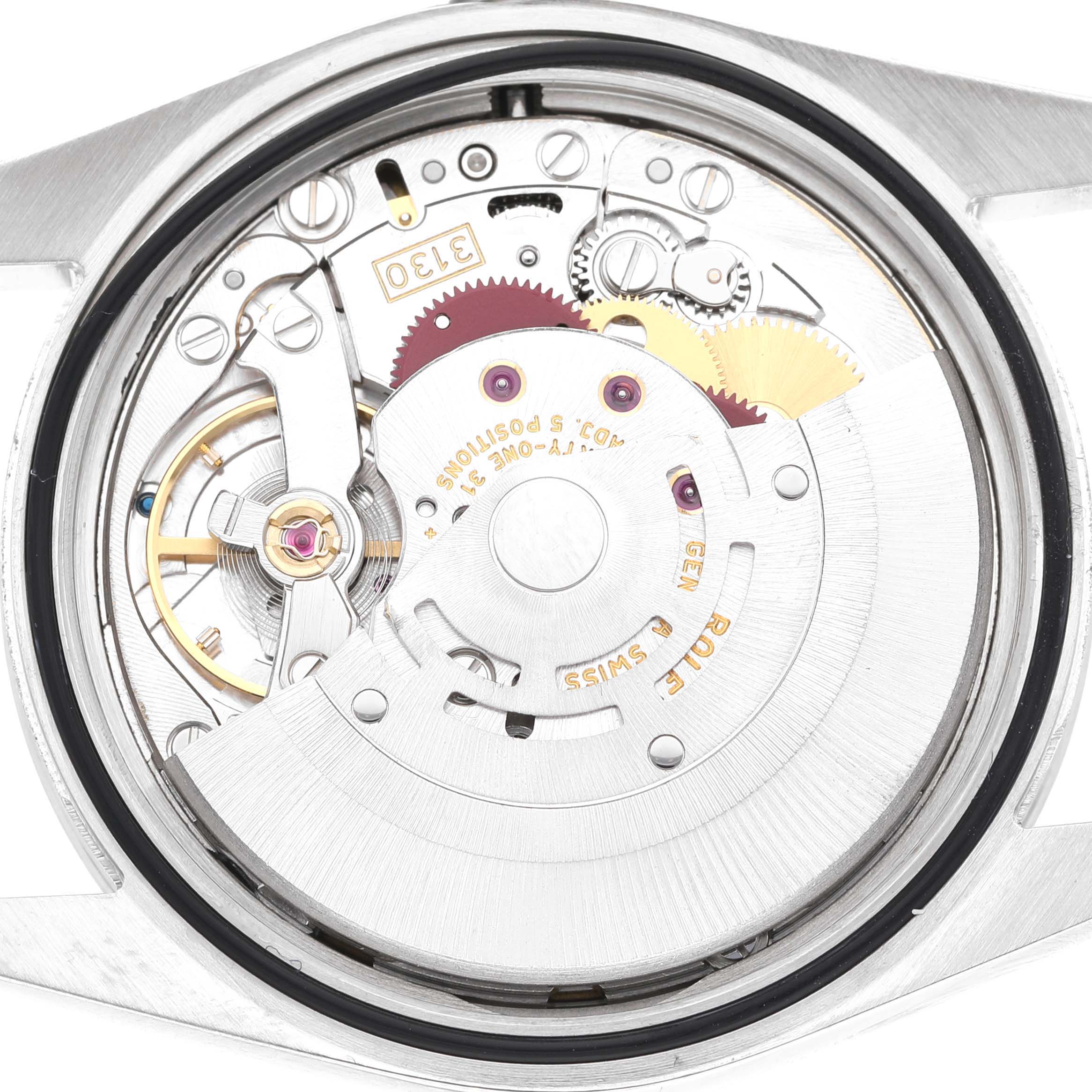 The image shows the back view of a Rolex Explorer 114270 Men's Stainless Steel Black Dial, highlighting its intricate mechanical movement.