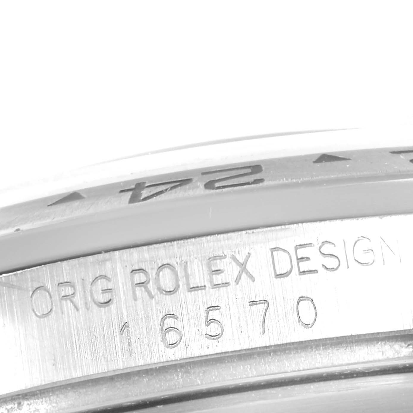Close-up showing the serial number engraving on the side of the bezel of a Rolex Explorer 16570 Men
s Stainless Steel Black Dial 16570 Men
s Stainless Steel Black Dial model watch.