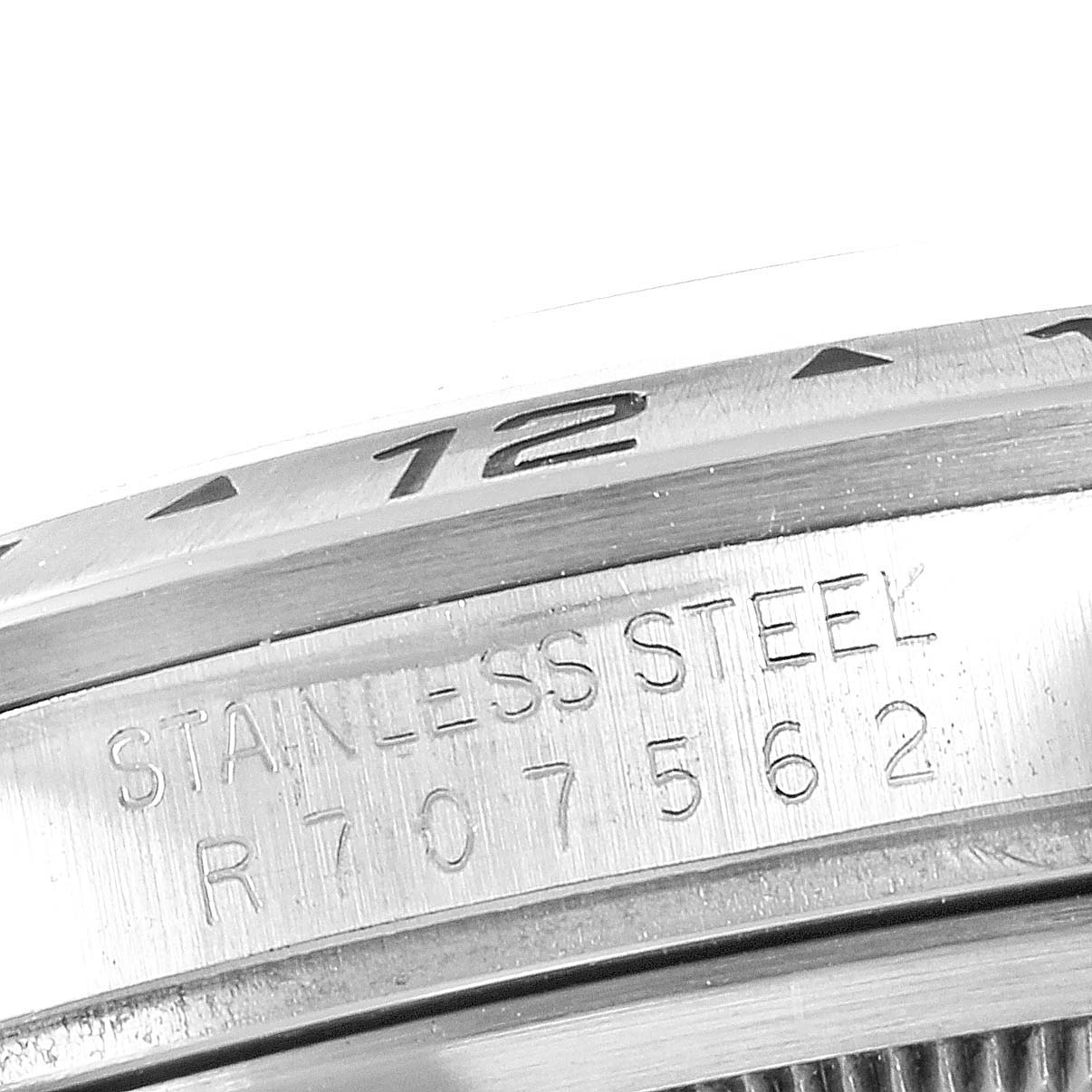 Close-up angle showing part of the bezel and the engraved serial number on the side of the Rolex Explorer 16570 Men
s Stainless Steel Black Dial 16570 Men
s Stainless Steel Black Dial watch.