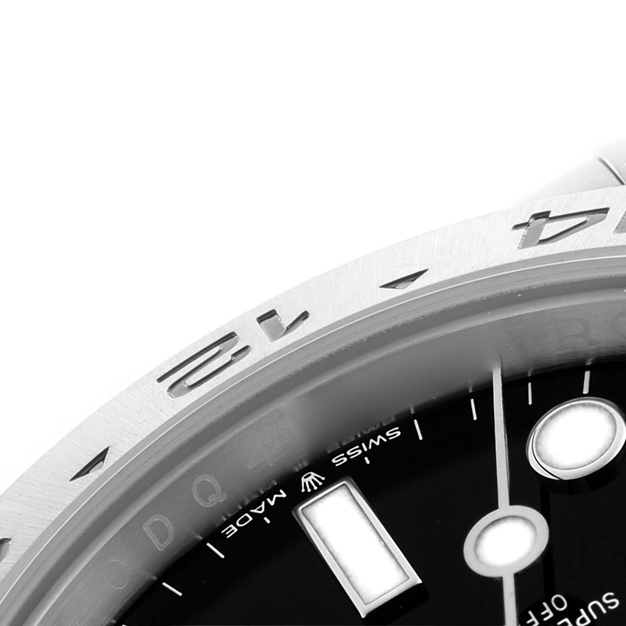 The image shows a close-up of the bezel and part of the dial on the Rolex GMT-Master 226570 Men's Stainless Steel Black Dial 226570 Men's Stainless Steel Black Dial.