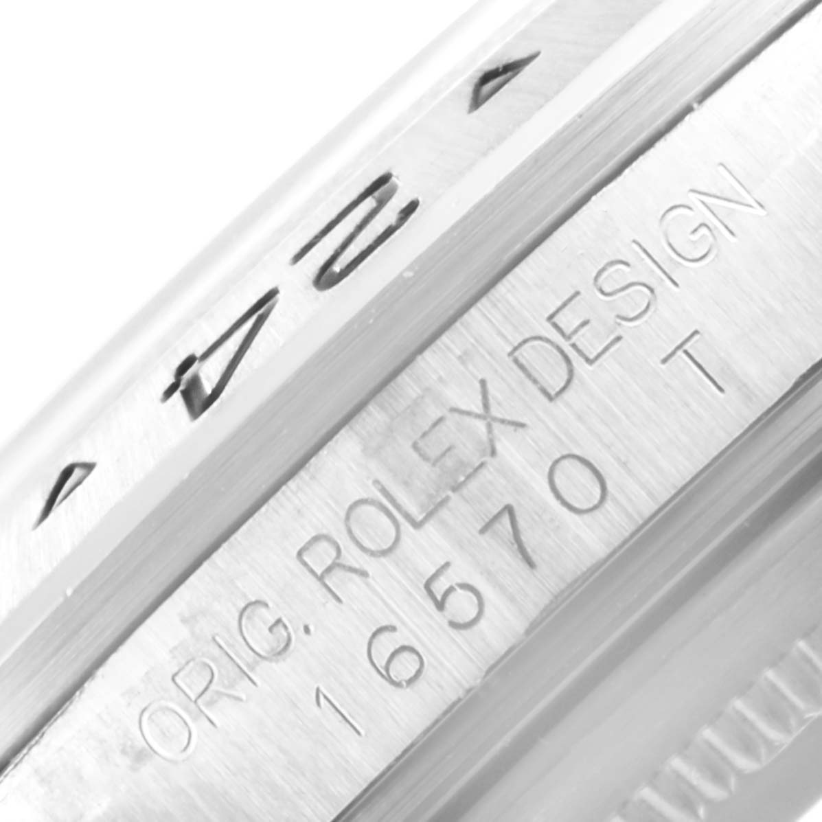 This close-up image shows the side engraving of the Rolex Explorer 16570 Men's Stainless Steel Black Dial 16570 Men's Stainless Steel Black Dial model 16570 with the words "ORIG. ROLEX DESIGN."