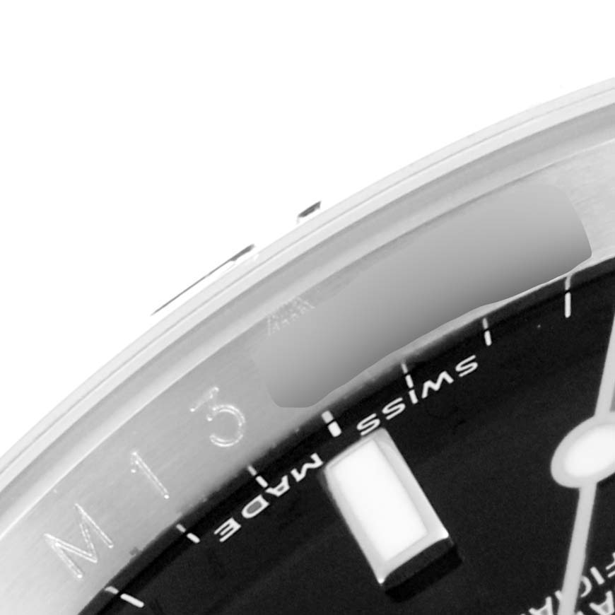 This close-up shows the watch face and part of the bezel of the Rolex Explorer 16570 Men's Stainless Steel Black Dial 16570 Men's Stainless Steel Black Dial model, displaying the "SWISS MADE" text.