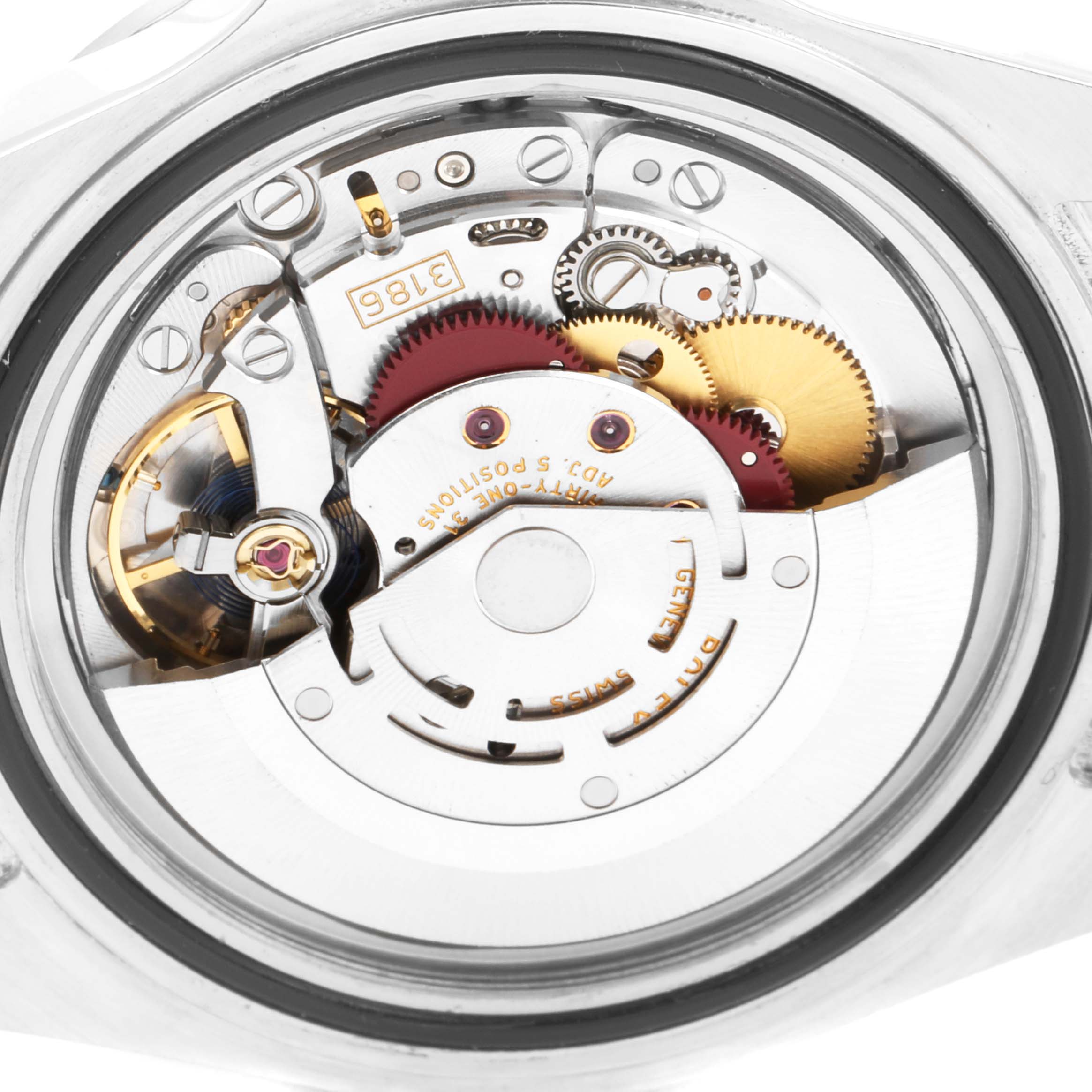 The image shows the internal movement parts of the Rolex Explorer 16570 Men's Stainless Steel Black Dial 16570 Men's Stainless Steel Black Dial watch from a back view, highlighting the gears and mechanisms.