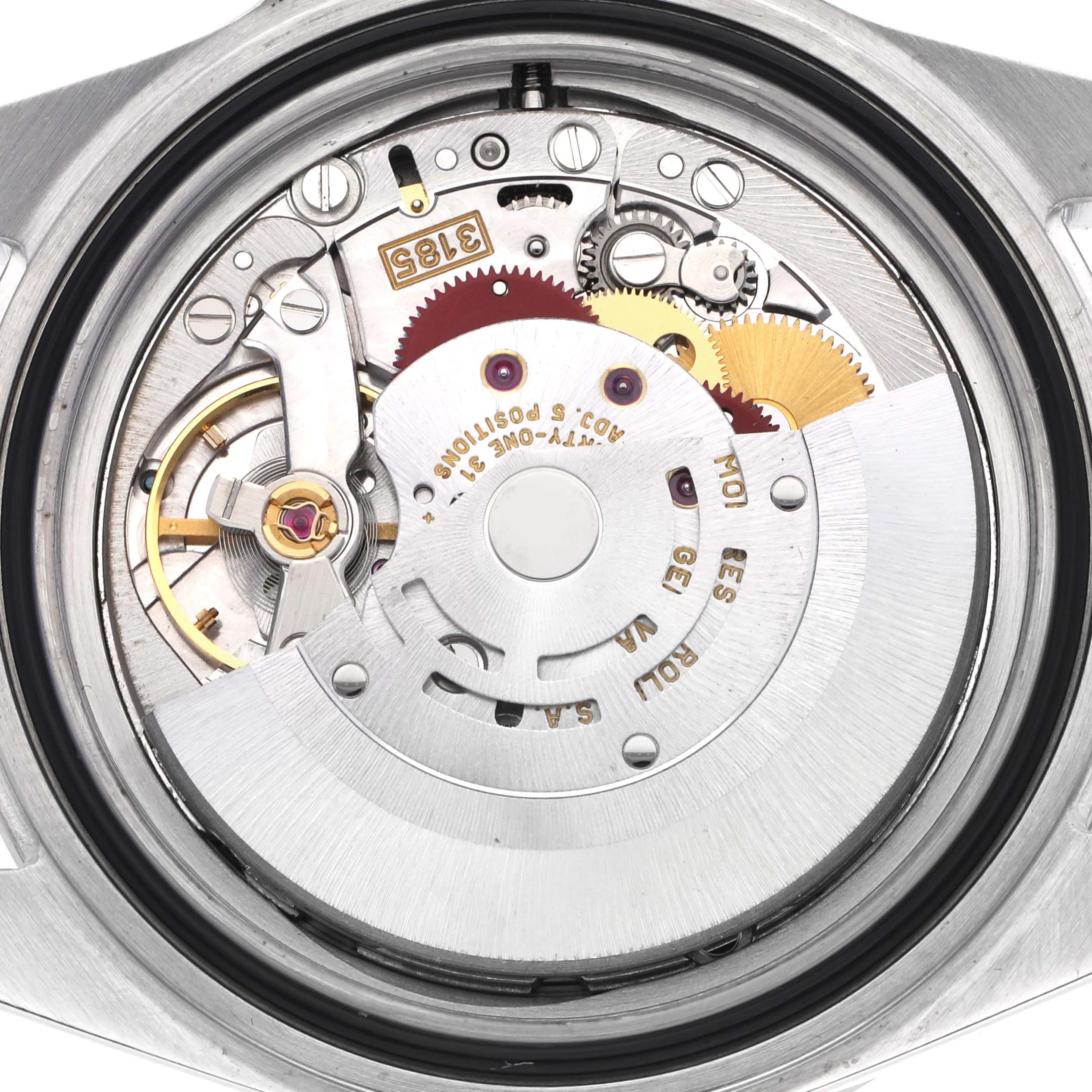 The image shows the movement of a Rolex Explorer 16570 Men's Stainless Steel White Dial 16570 Men's Stainless Steel White Dial watch from a back angle, highlighting the rotor and intricate mechanical components.