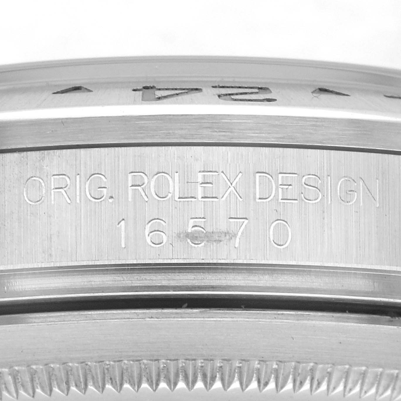 The image shows a close-up of the side engraving on a Rolex Explorer 16570 Men's Stainless Steel White Dial 16570 Men's Stainless Steel White Dial watch, displaying the model number and "Orig. Rolex Design."