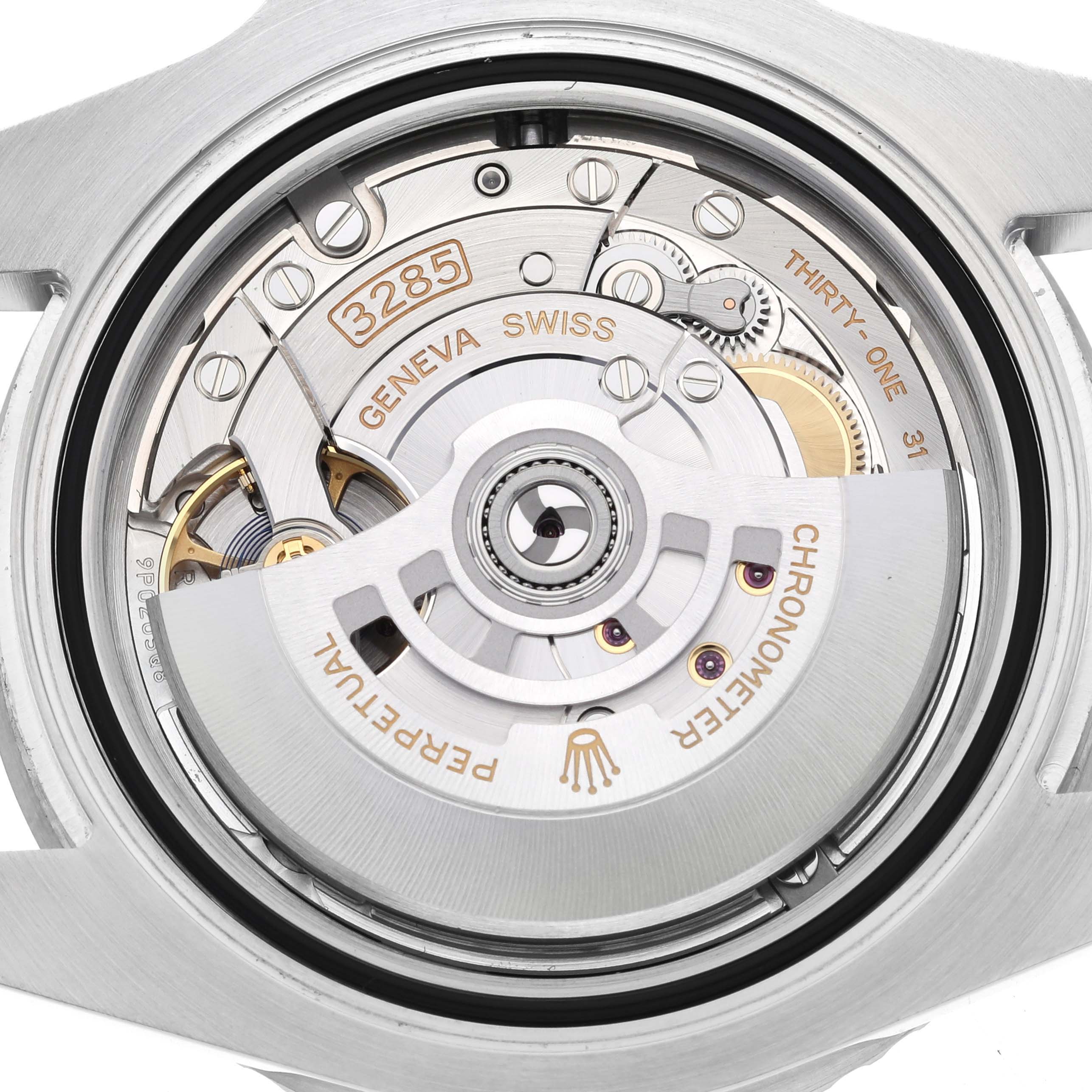 This is a close-up view of the Rolex GMT-Master 126710BLNR Men's Stainless Steel Black Dial 126710BLNR Men's Stainless Steel Black Dial's movement, showcasing its intricate internal components.