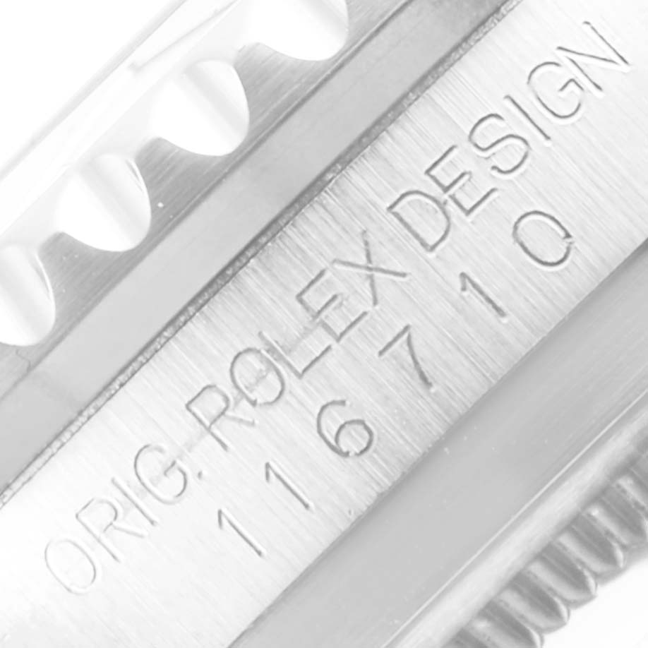 The image shows a close-up angle of the case side on a Rolex GMT-Master 116710 Men
s Stainless Steel Black Dial 116710 Men
s Stainless Steel Black Dial, displaying the model number and "ROLEX DESIGN" engraving.