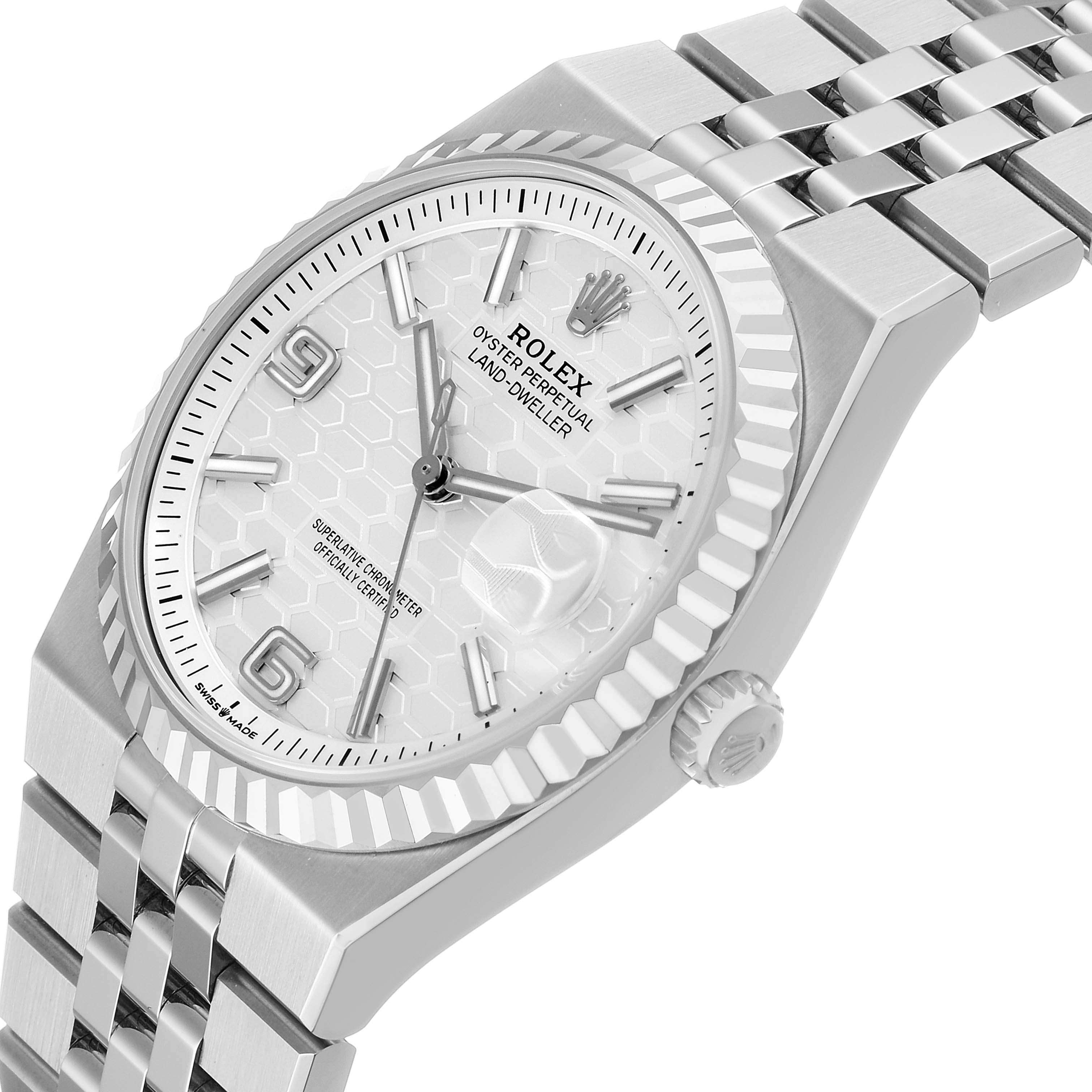 The Rolex Land-Dweller watch is shown at an angled view, highlighting the bezel, dial, and bracelet.