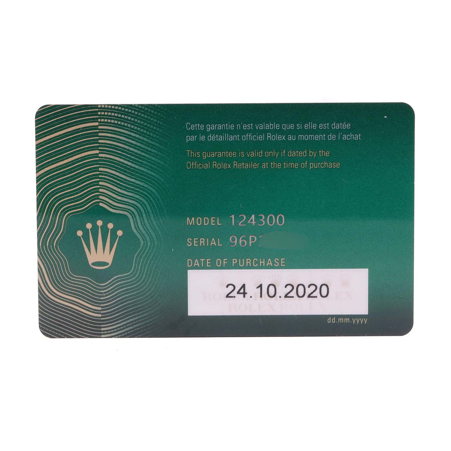 This image shows the warranty card for the Rolex Oyster Perpetual 124300 Men
s Stainless Steel Blue Dial 124300 Men
s Stainless Steel Blue Dial model 124300, displaying the serial number and date of purchase.