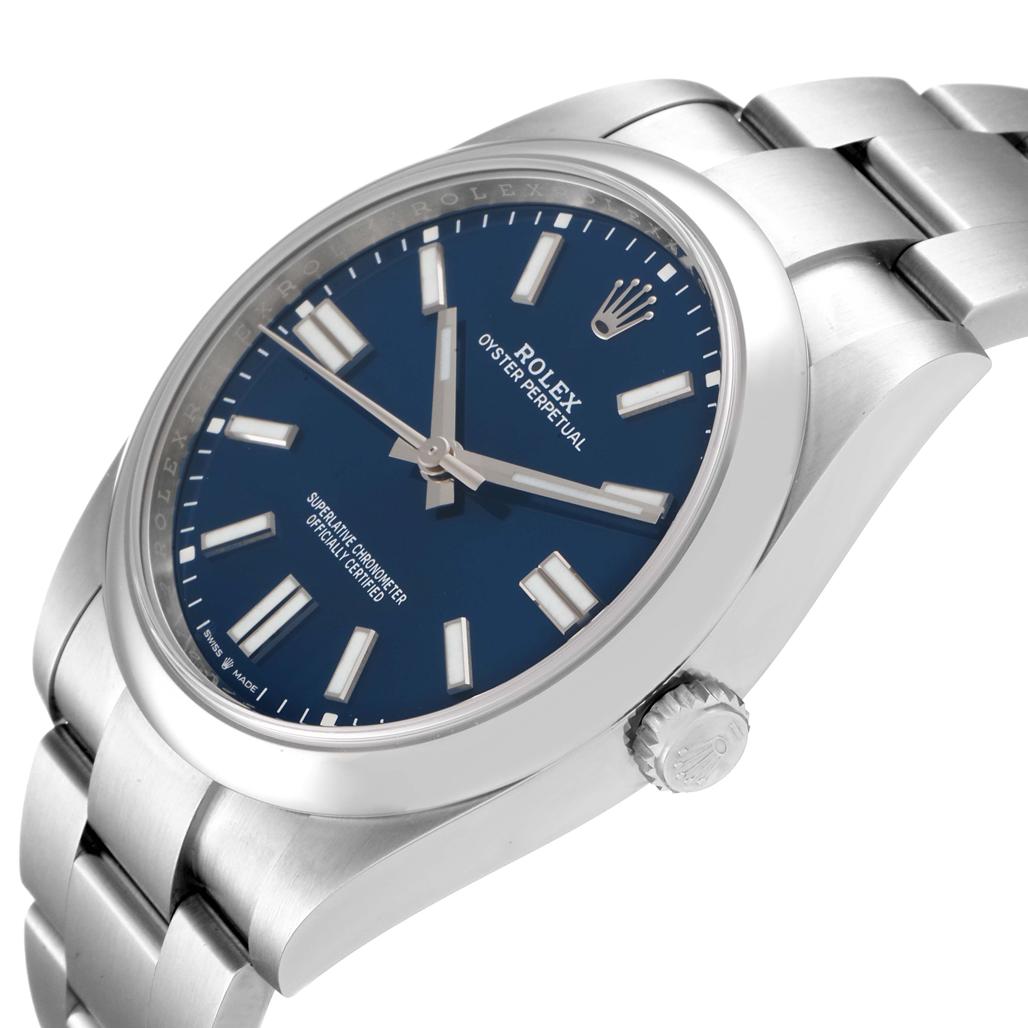 The image shows a Rolex Oyster Perpetual 124300 Men
s Stainless Steel Blue Dial 124300 Men
s Stainless Steel Blue Dial watch from an angled close-up, highlighting its blue dial, crown, and bracelet.