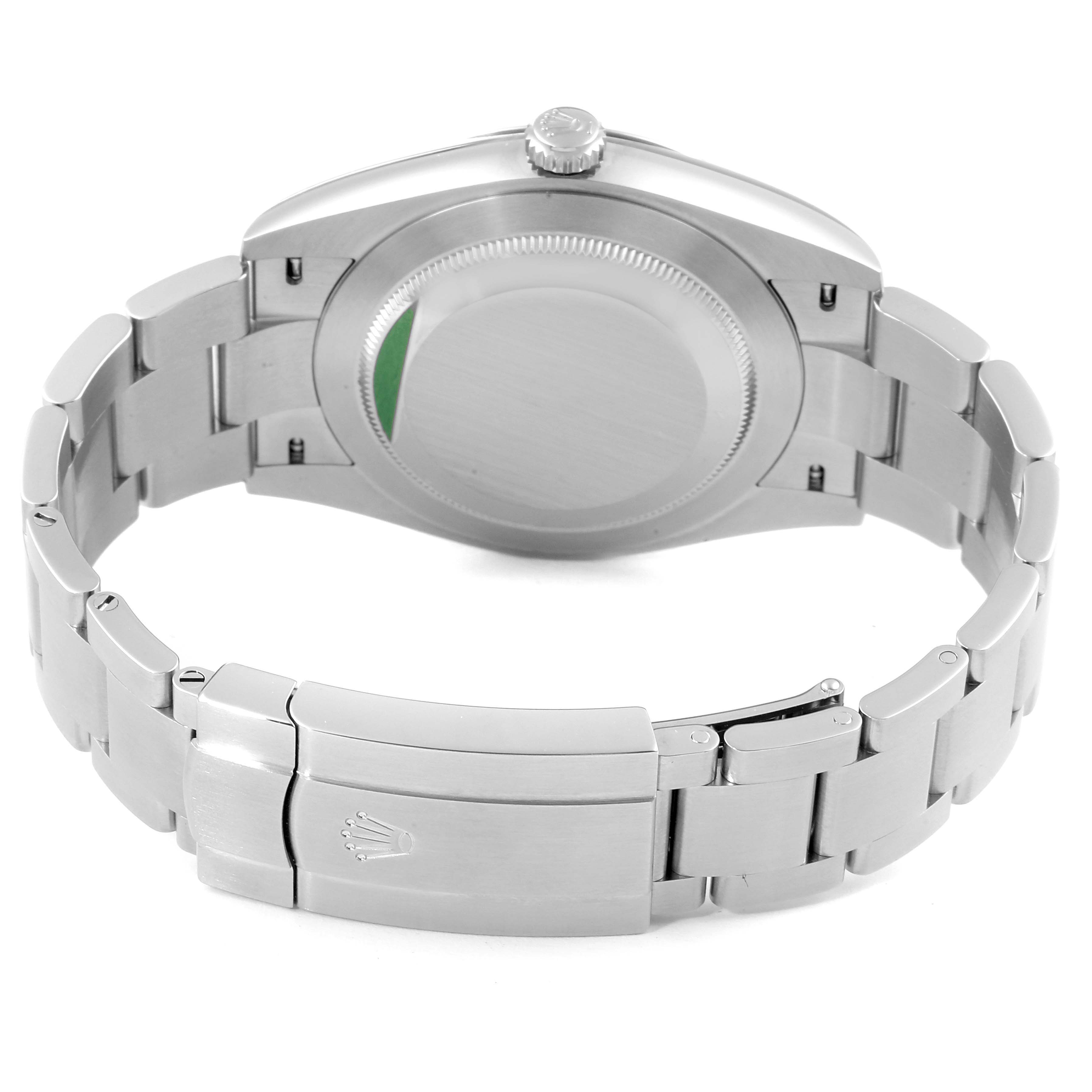 This image shows the back case and clasp of a Rolex Oyster Perpetual 124300 Men
s Stainless Steel Blue Dial 124300 Men
s Stainless Steel Blue Dial watch from a rear angle.