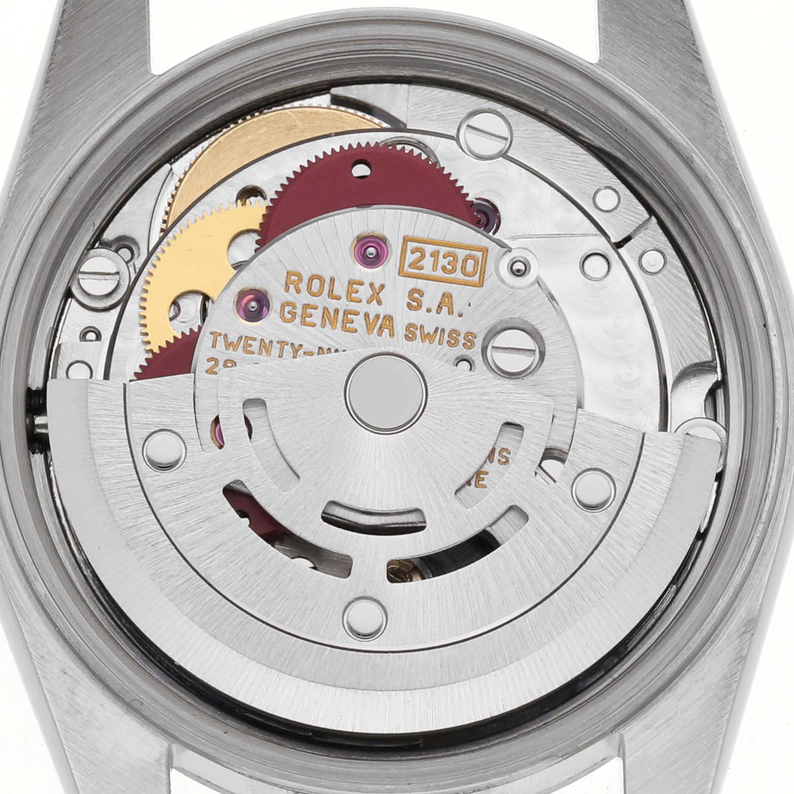 This image shows the movement of a Rolex Oyster Perpetual 67180 Women's Stainless Steel Silver Dial 67180 Women's Stainless Steel Silver Dial watch from the back, highlighting its intricate gears and rotor.