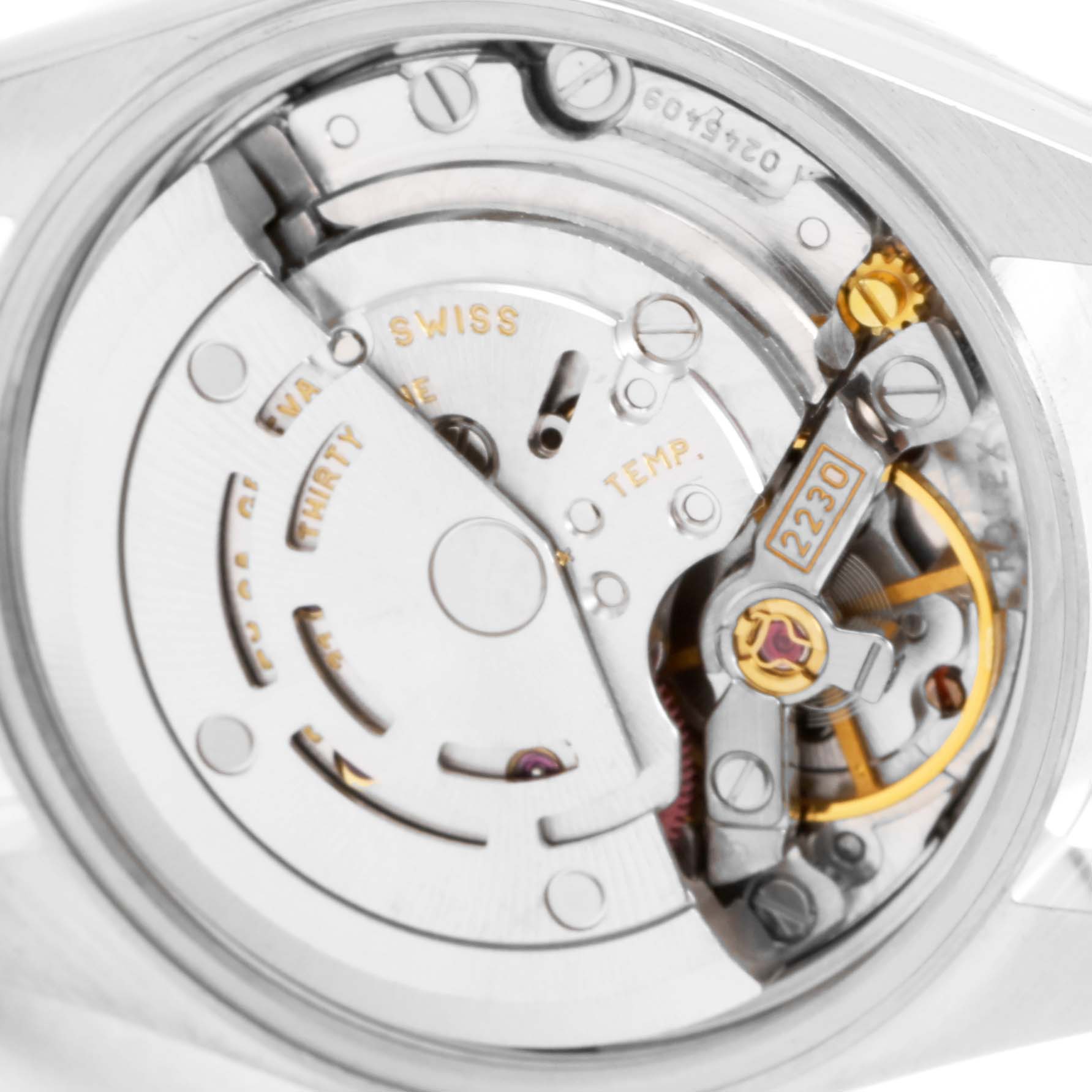 This image shows the inner mechanical movement of the Rolex Oyster Perpetual 76080 Women's Stainless Steel Pink Dial 76080 Women's Stainless Steel Pink Dial watch from a close-up angle.