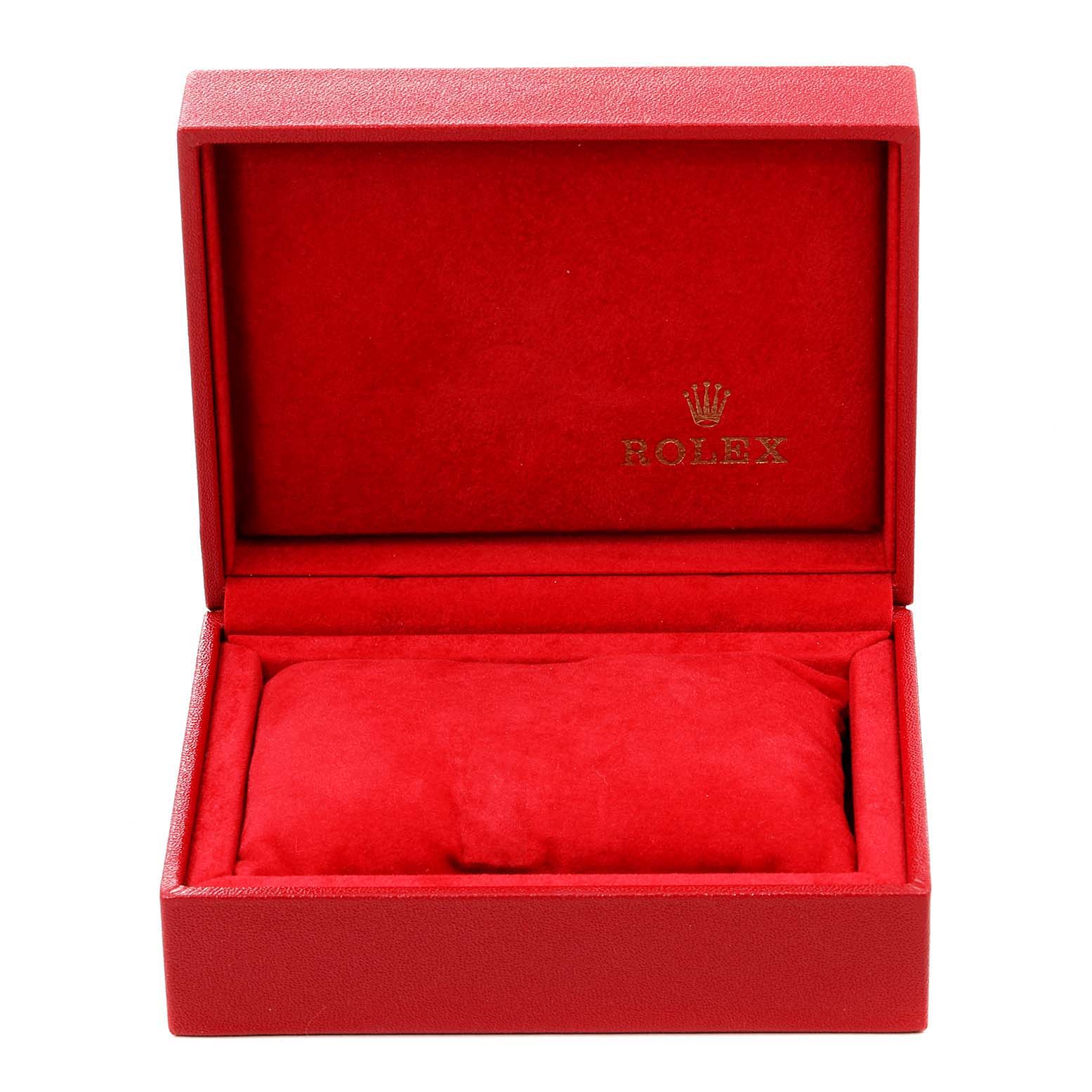 The image shows an open red presentation box for the Rolex Oyster Perpetual 76080 Women's Stainless Steel Pink Dial 76080 Women's Stainless Steel Pink Dial watch, featuring the brand's logo inside the lid.