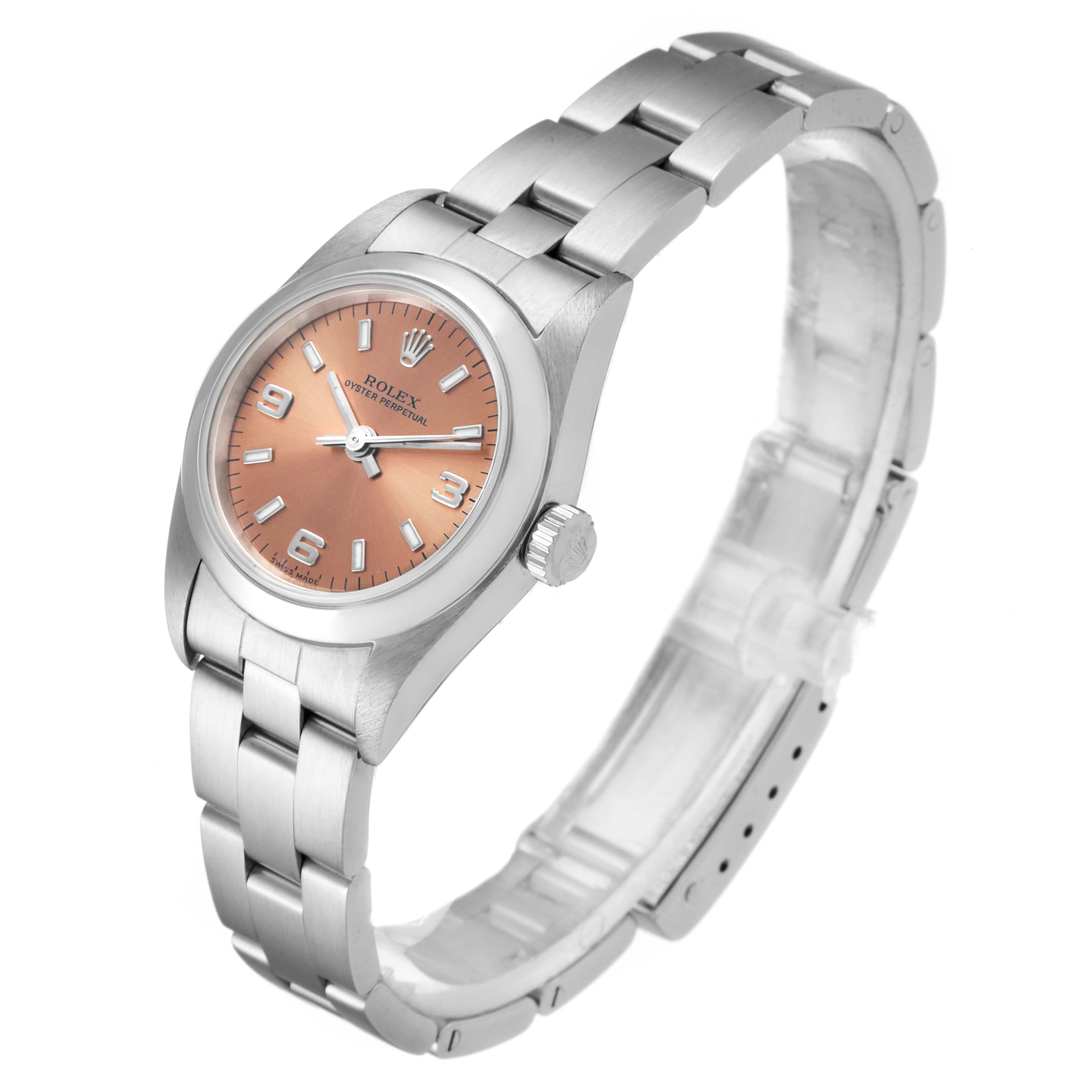 This image shows a side view of the Rolex Oyster Perpetual 76080 Women's Stainless Steel Pink Dial 76080 Women's Stainless Steel Pink Dial watch, highlighting its bracelet, case, crown, and dial.